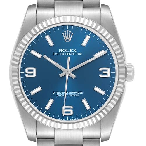 The Rolex Oyster Perpetual 116034 Men's Stainless Steel Blue Dial watch is shown from the front, highlighting the blue dial, hour markers, bezel, and bracelet.
