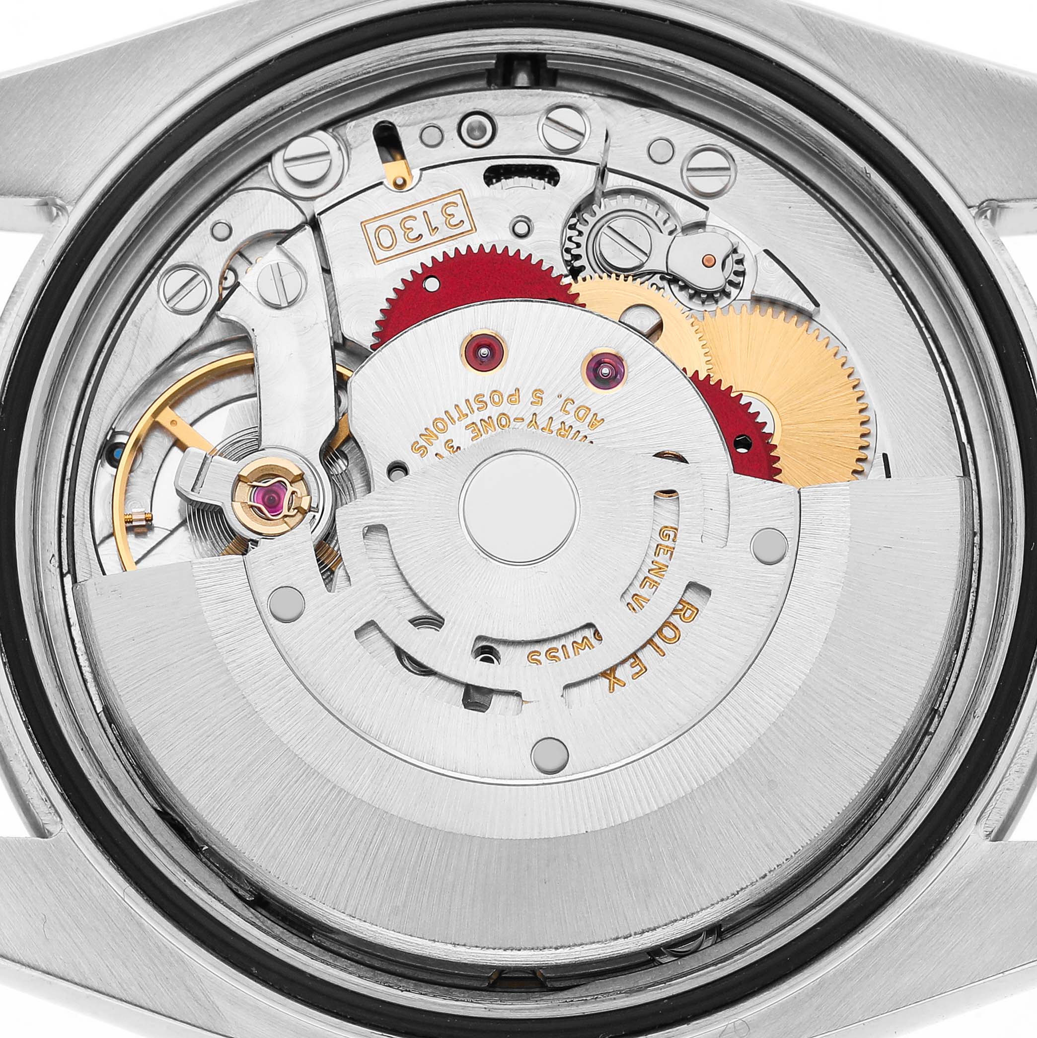 The image shows the movement and internal components of a Rolex Oyster Perpetual 116034 Men's Stainless Steel Blue Dial watch from a back angle.