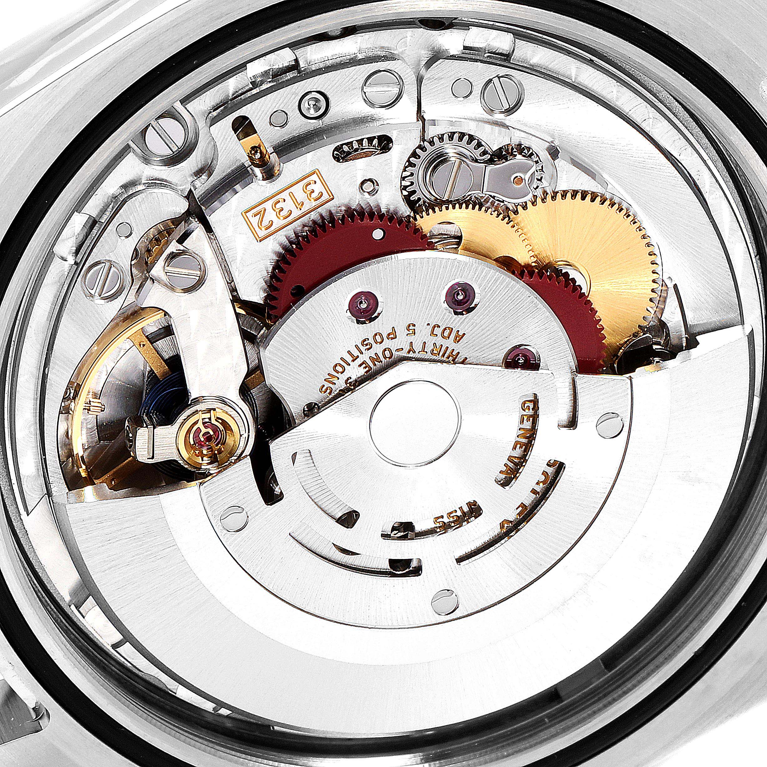 This image shows the internal mechanical movement of a Rolex Oyster Perpetual 114300 Men's Stainless Steel Silver Dial 114300 Men's Stainless Steel Silver Dial watch, viewed from the back.