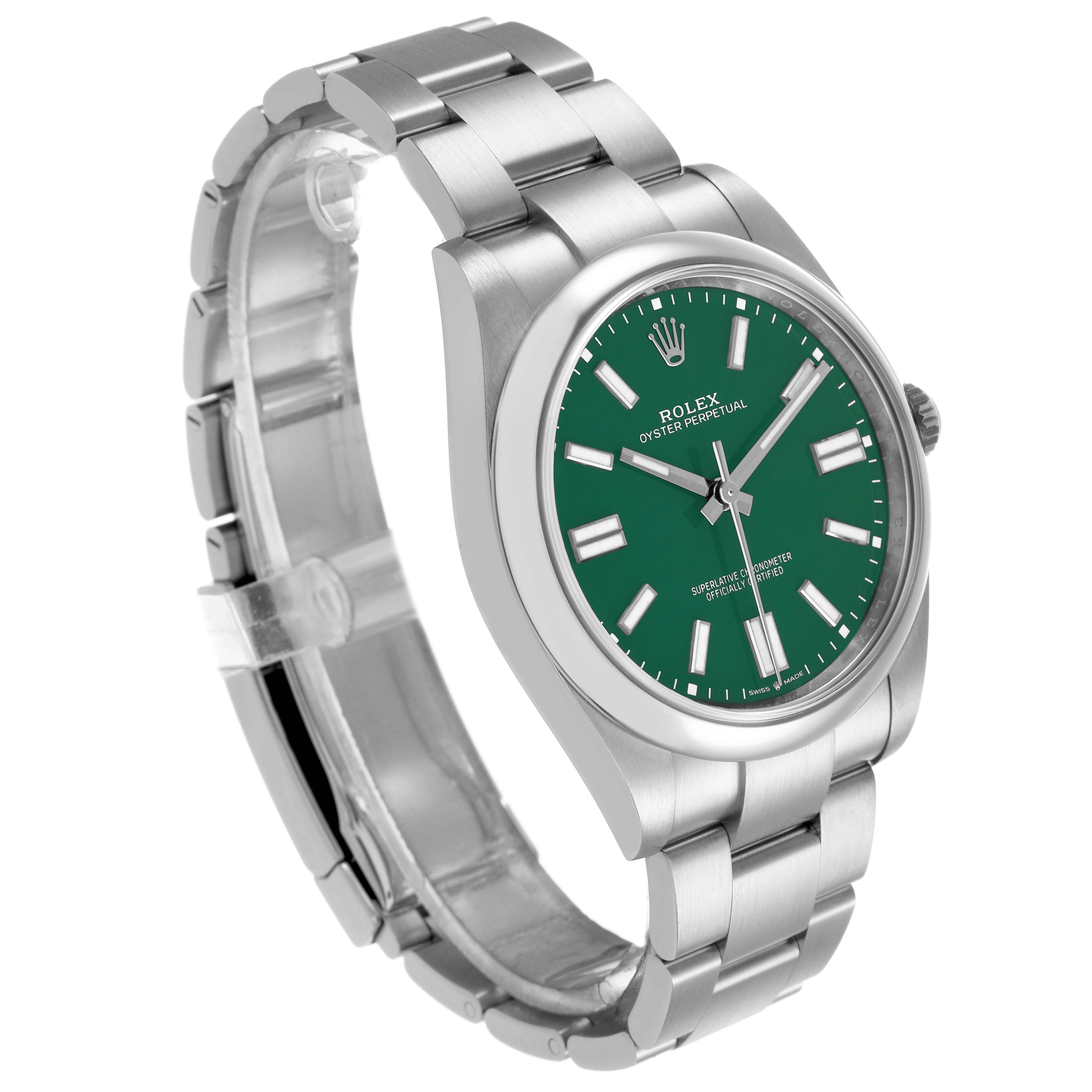 The Rolex Oyster Perpetual 124300 Men's Stainless Steel Green Dial watch is shown at a three-quarter angle, displaying the green dial, crown, and bracelet.