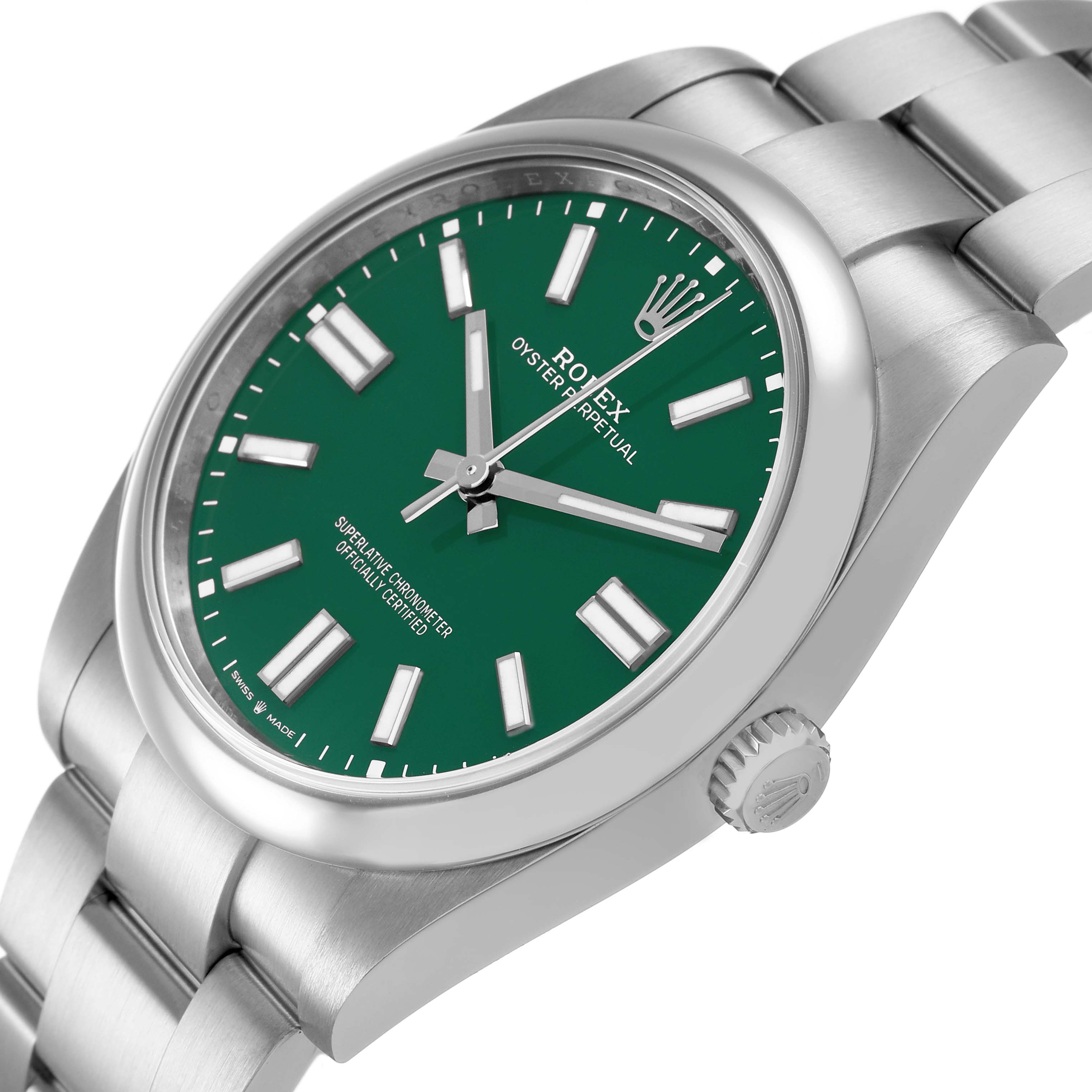 The Rolex Oyster Perpetual 124300 Men's Stainless Steel Green Dial watch is shown at a three-quarter angle, highlighting its green dial, case, lugs, and bracelet.
