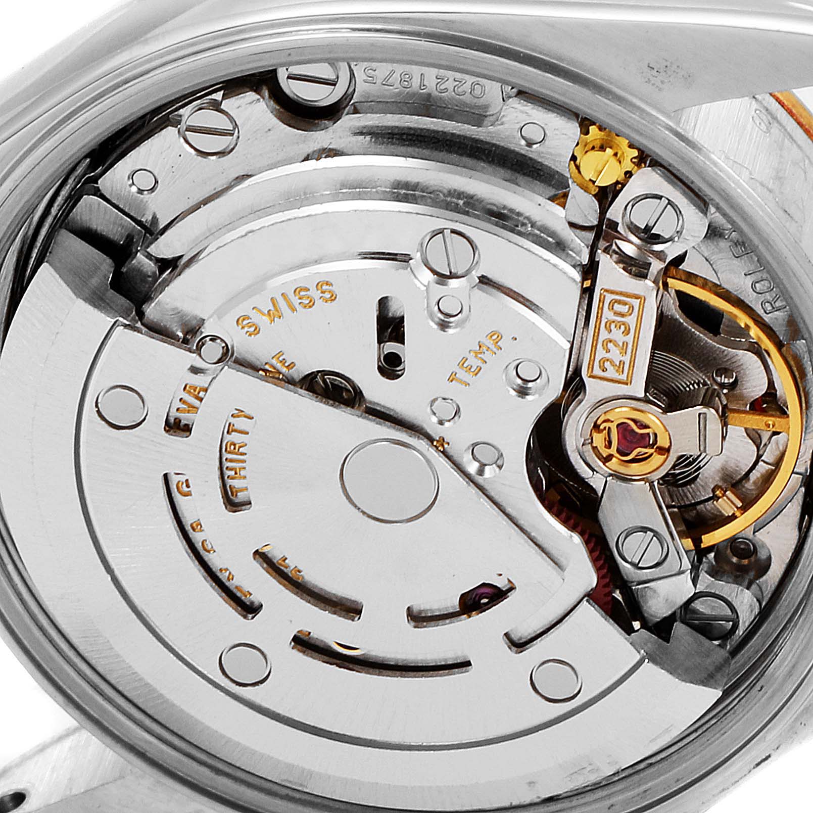 The image shows a close-up view of the movement and inner workings of a Rolex Oyster Perpetual 76193 Women's Steel and Gold (two tone) Champagne Dial 76193 Women's Steel and Gold (two tone) Champagne Dial watch.