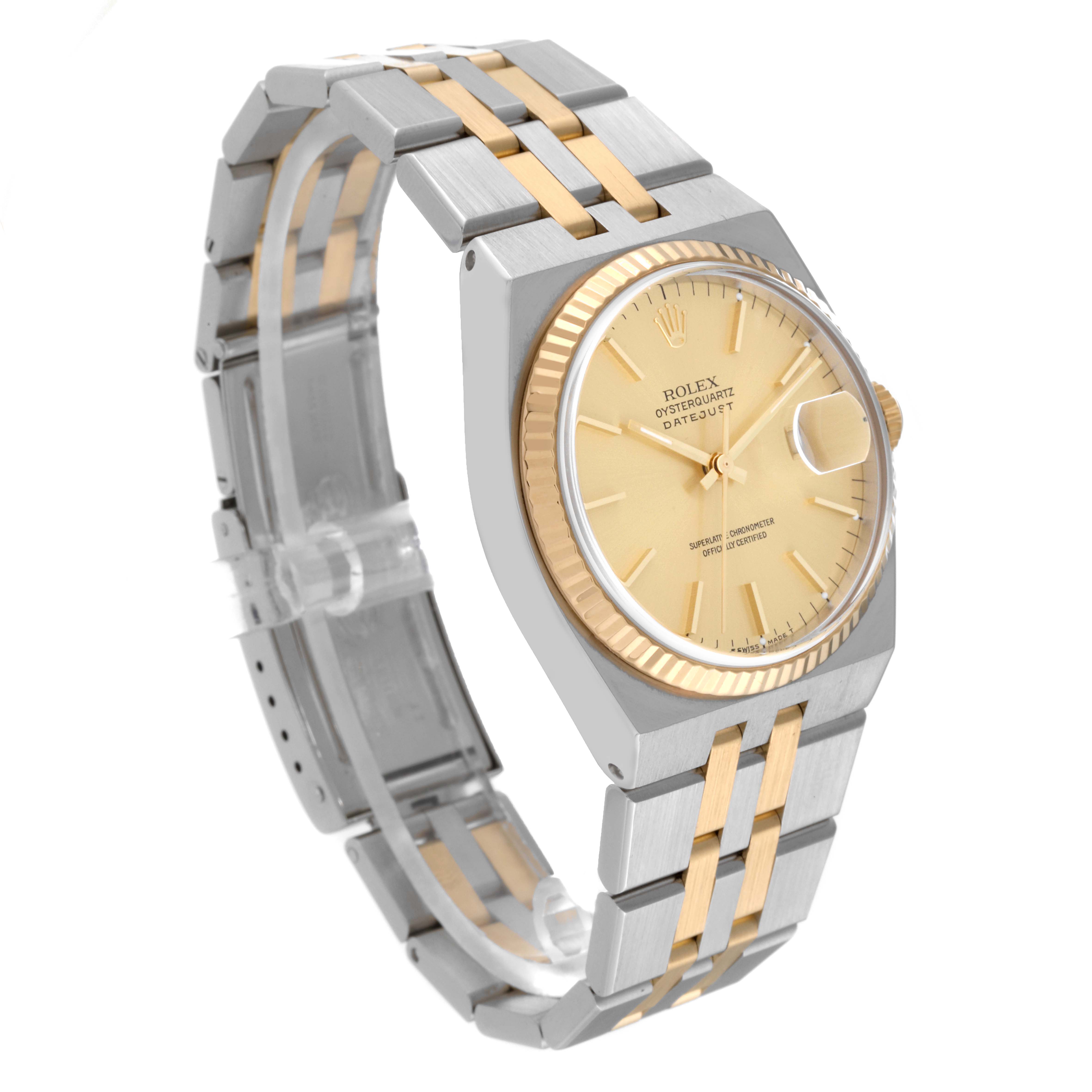 The Rolex Oysterquartz 17013 Men's Steel and Gold (two tone) Champagne Dial 17013 Men's Steel and Gold (two tone) Champagne Dial model is shown at an angle displaying its gold dial, fluted bezel, and two-tone metal bracelet.