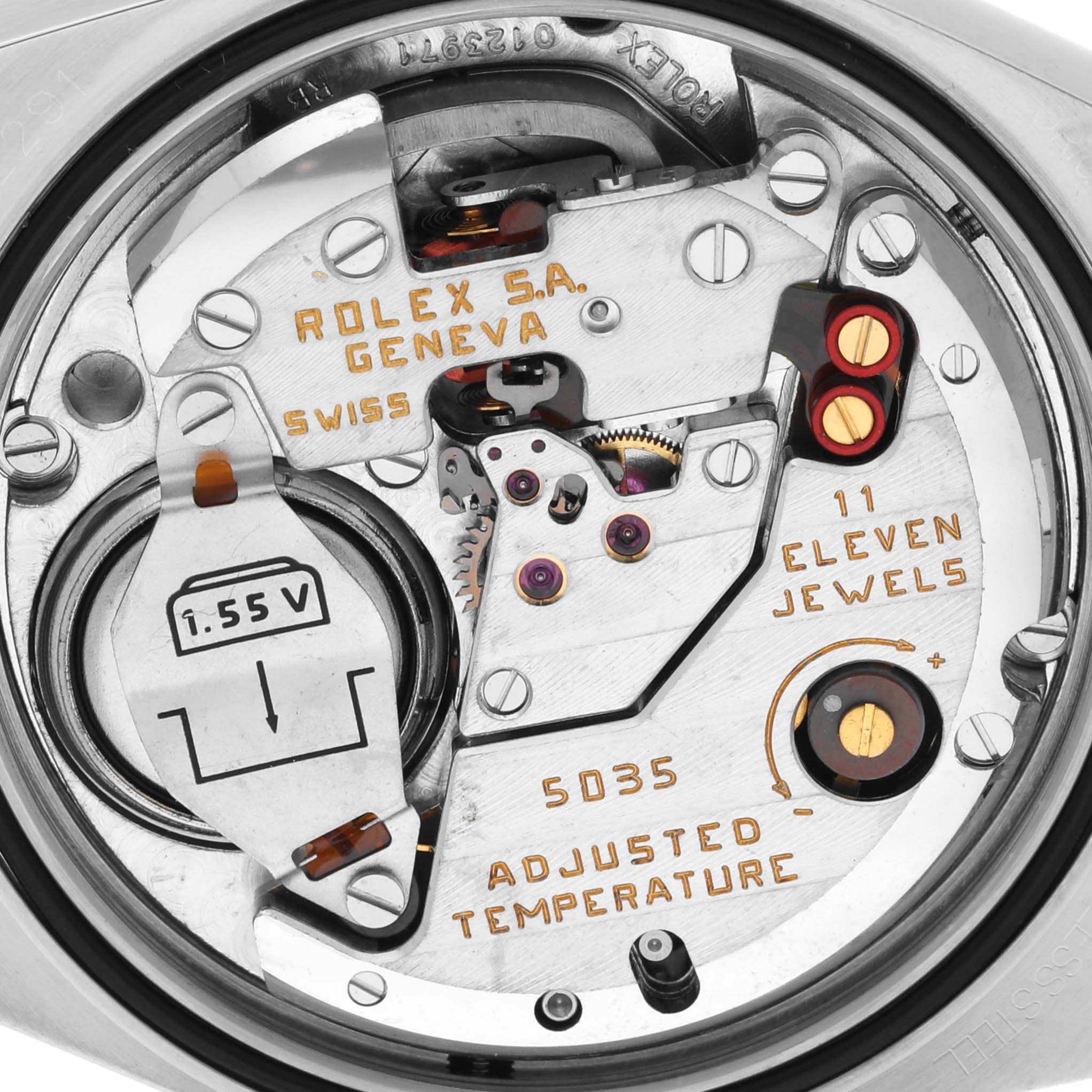 The image shows the internal mechanism of a Rolex Oysterquartz 17013 Men's Steel and Gold (two tone) Champagne Dial 17013 Men's Steel and Gold (two tone) Champagne Dial watch, highlighting the battery and jewel details.
