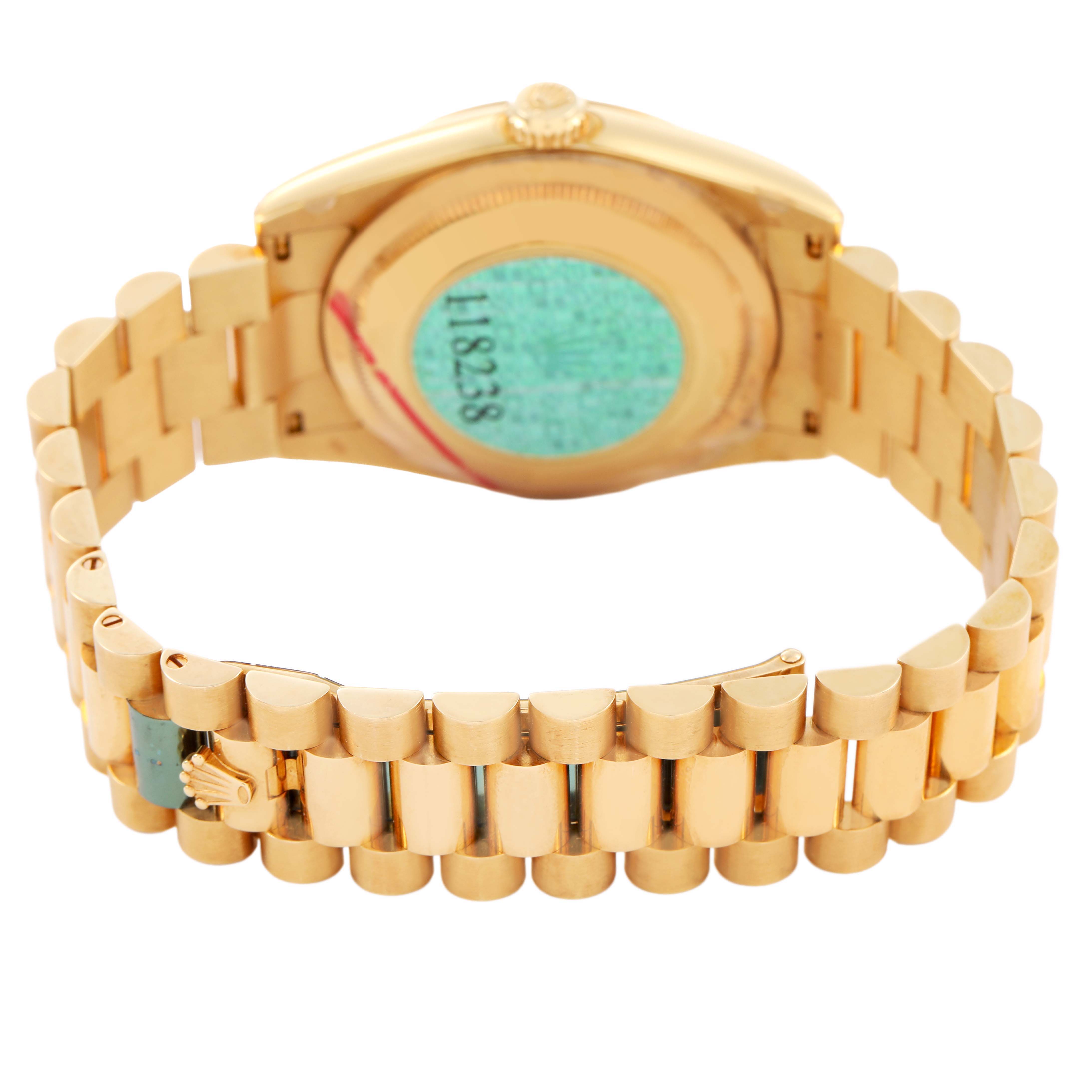 The image shows the back of a Rolex President 118238 Men's Yellow Gold Champagne Dial model watch, highlighting the gold bracelet and case back.
