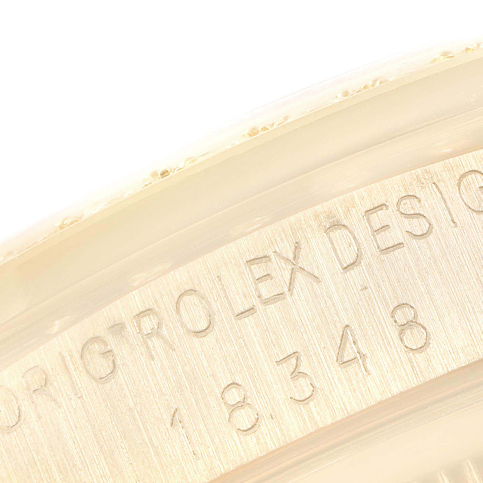 This image shows a close-up of the engraved model number on the case of a Rolex President 18348 Men's Yellow Gold Champagne Dial 18348 Men's Yellow Gold Champagne Dial watch.