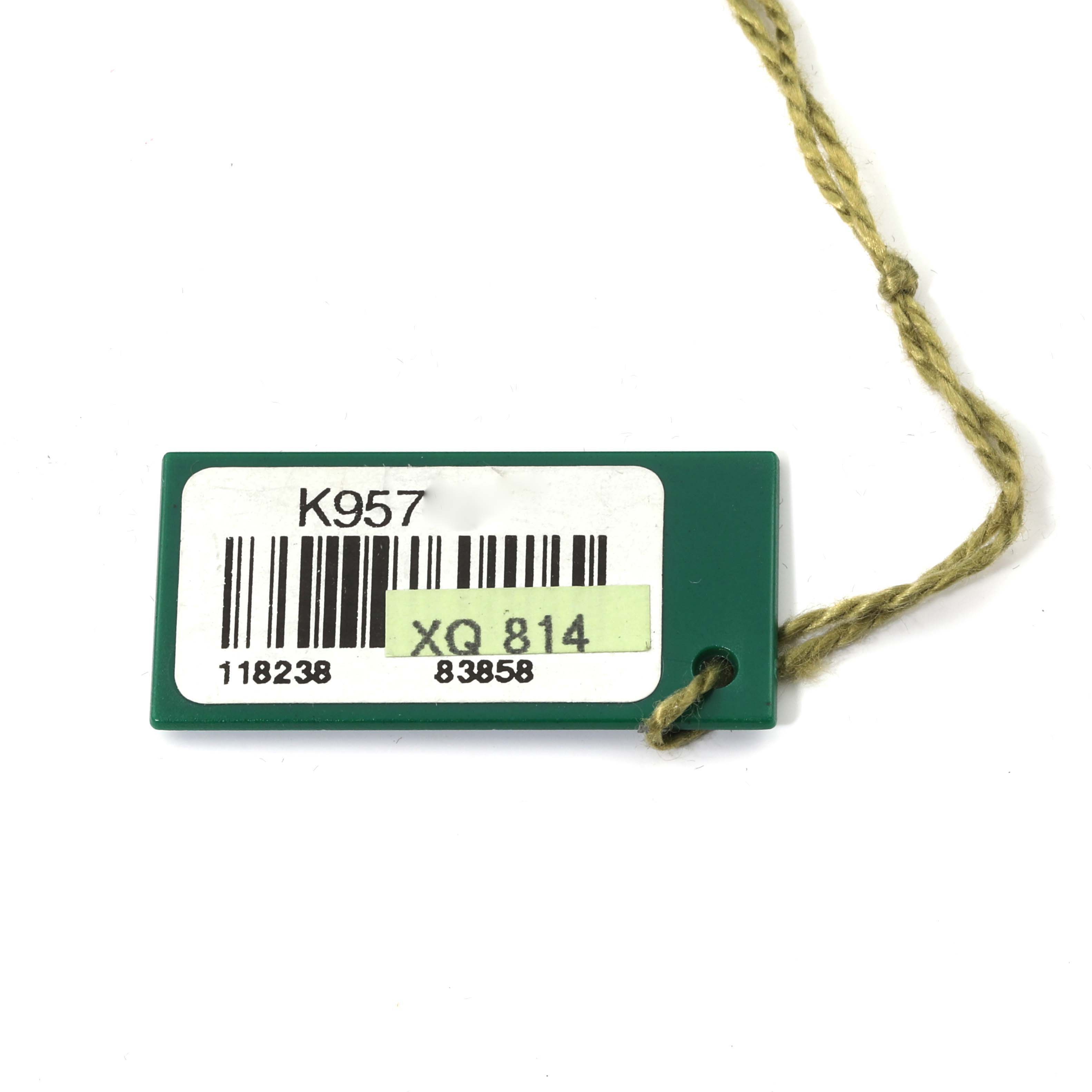 The image shows a green tag with a string, typically attached to a Rolex President 118238 Men's Yellow Gold Black Dial 118238 Men's Yellow Gold Black Dial model watch for identification.