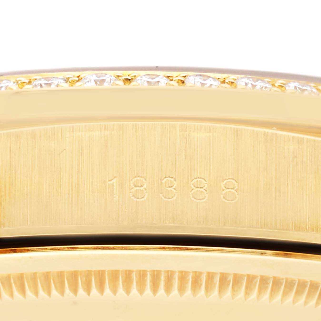 This close-up image showcases the serial number on the side case and the diamond-encrusted bezel of a Rolex President 18388 Men
s Yellow Gold Grey Dial 18388 Men
s Yellow Gold Grey Dial model watch.