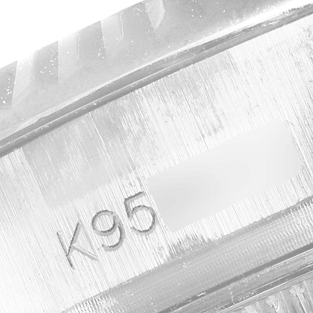 The image shows a close-up of the serial number engraving on the side of the case of a Rolex President 179179 Women
s White Gold Silver Dial 179179 Women
s White Gold Silver Dial model watch.