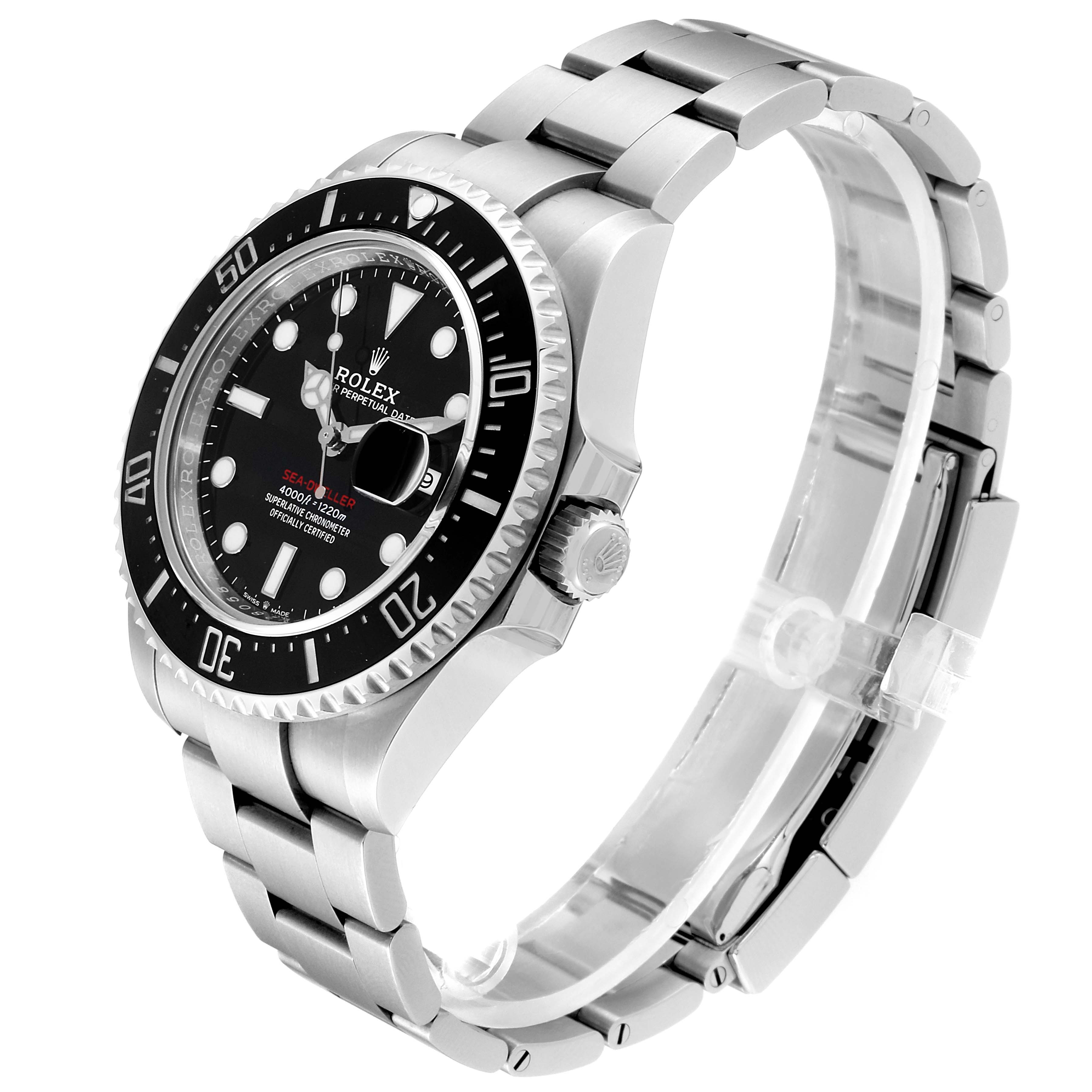 The image shows a side angle of the Rolex Sea-Dweller 126600 Men
s Stainless Steel Black Dial 126600 Men
s Stainless Steel Black Dial watch, highlighting its bezel, dial, crown, and bracelet.