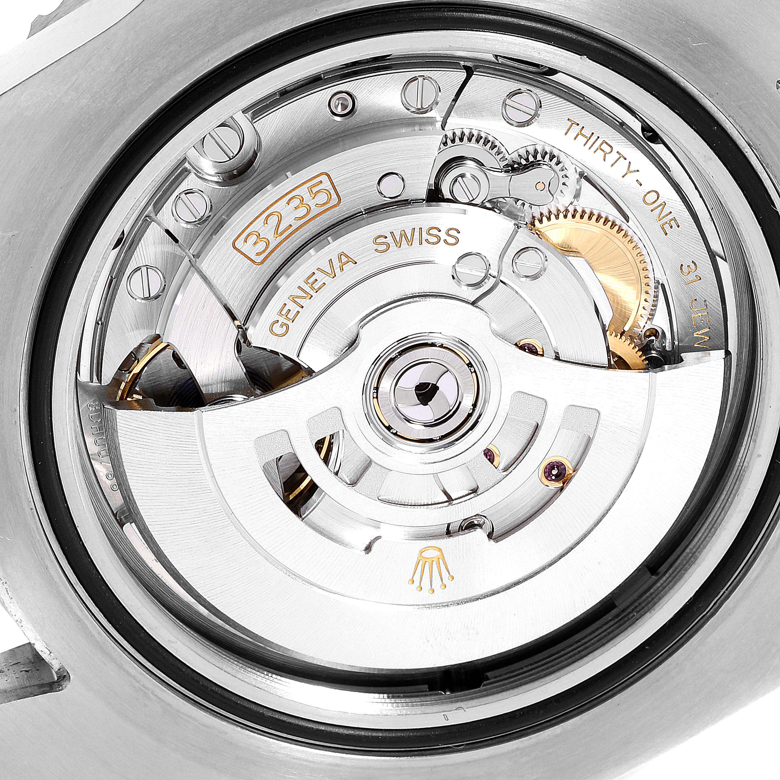 This is a close-up shot of the movement of a Rolex Sea-Dweller 126600 Men
s Stainless Steel Black Dial 126600 Men
s Stainless Steel Black Dial, showcasing the intricate inner mechanisms.