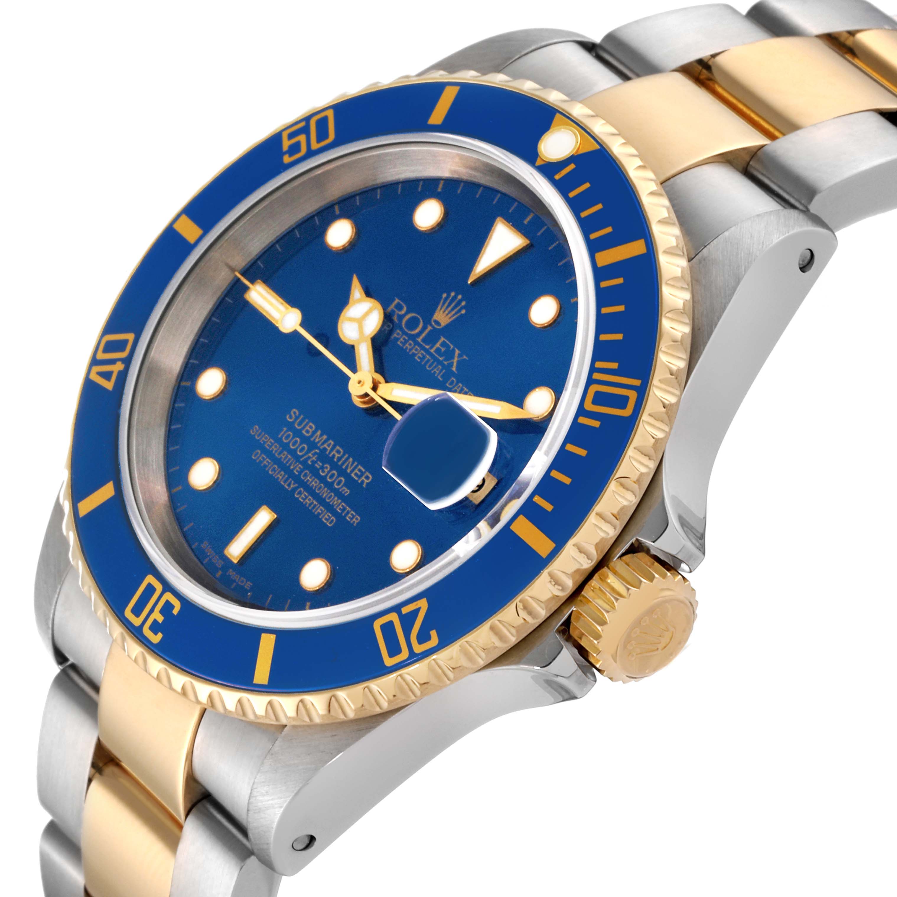 This image shows a close-up angle of a Rolex Submariner 16613 Men's Steel and Gold (two tone) Blue Dial 16613 Men's Steel and Gold (two tone) Blue Dial watch featuring its blue dial, gold bezel, and two-tone bracelet.