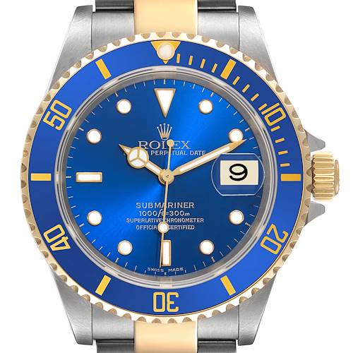 This image shows a close-up view of the Rolex Submariner watch face, bezel, and part of the bracelet.