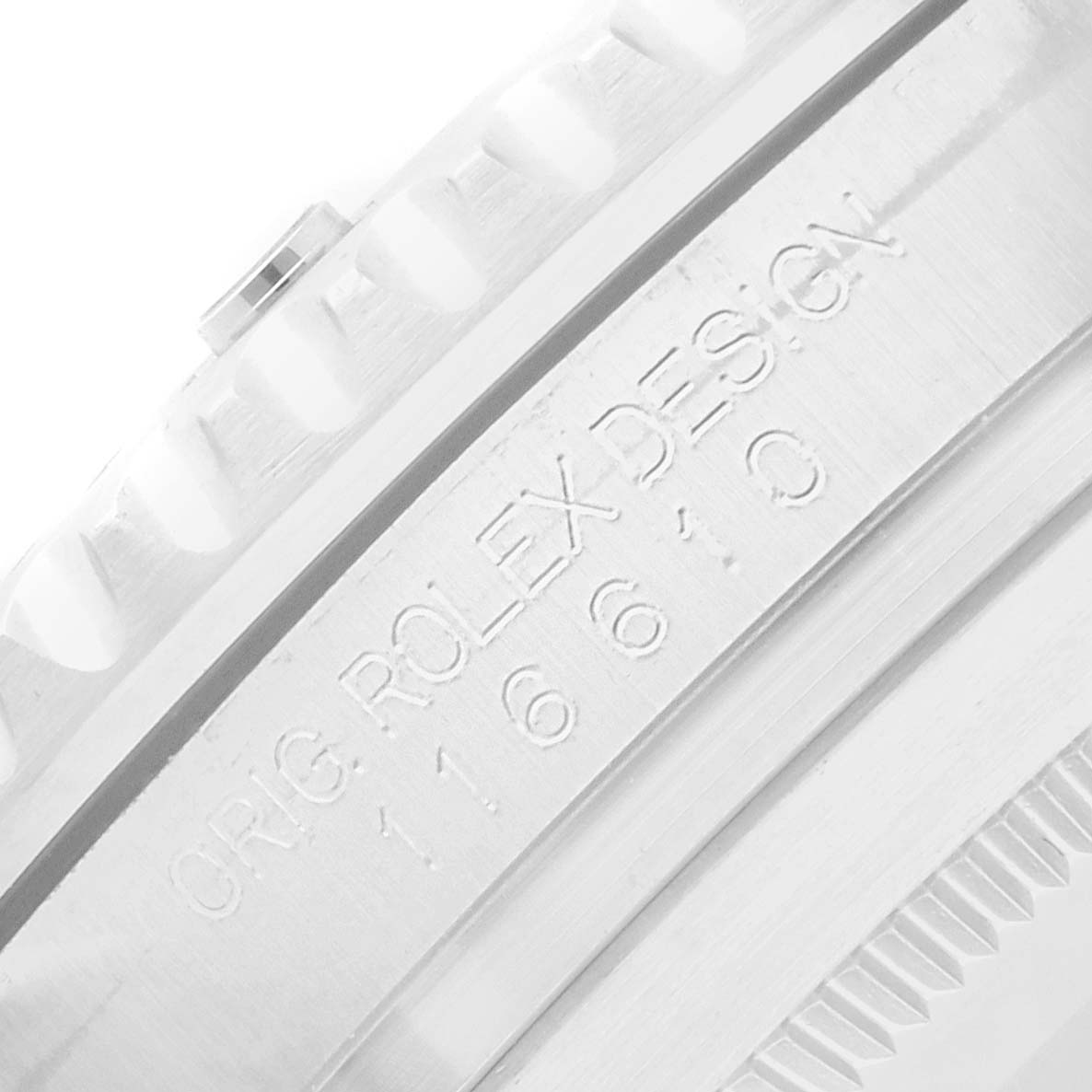 The image shows the side of a Rolex Submariner 116610 Men's Stainless Steel Black Dial watch, focusing on the engraved serial number on the case.