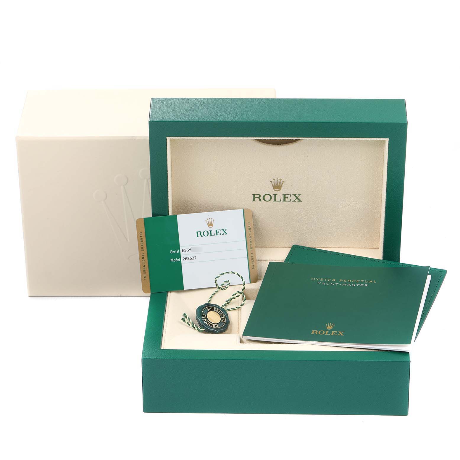 The image shows the packaging, box, manuals, guarantee card, and hang tag for a Rolex Yacht-Master 268622 Men
s Stainless Steel Grey Dial 268622 Men
s Stainless Steel Grey Dial watch.