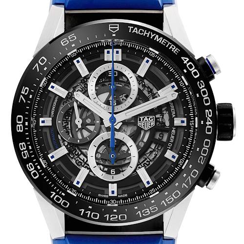 The image shows a close-up of the dial and bezel of the Tag Heuer Carrera watch model, highlighting the chronograph subdials and tachymeter scale.