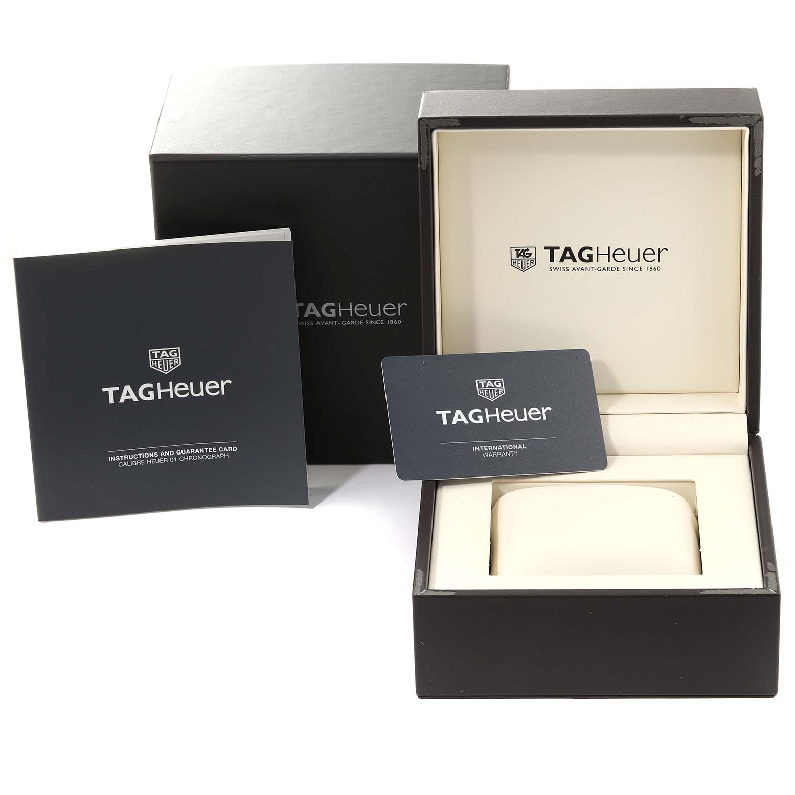 The image shows the packaging, box, and warranty card for a Tag Heuer Carrera CAR2A1T.FT6052 Men's Titanium Black Dial CAR2A1T.FT6052 Men's Titanium Black Dial watch.