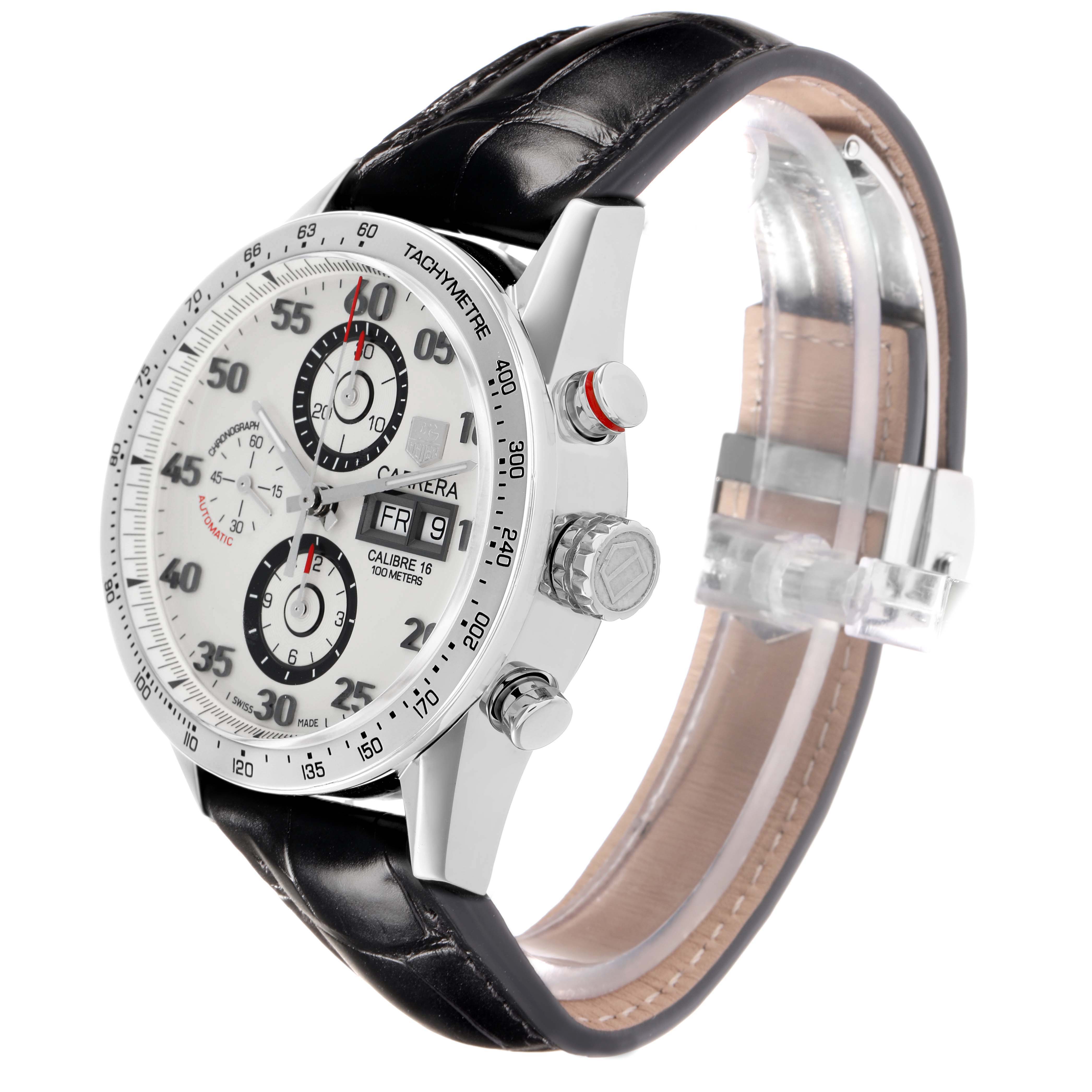 The Tag Heuer Carrera CV2A11 Men
s Stainless Steel Silver Dial watch is shown at an angle highlighting the face, crown, pushers, and black leather strap.