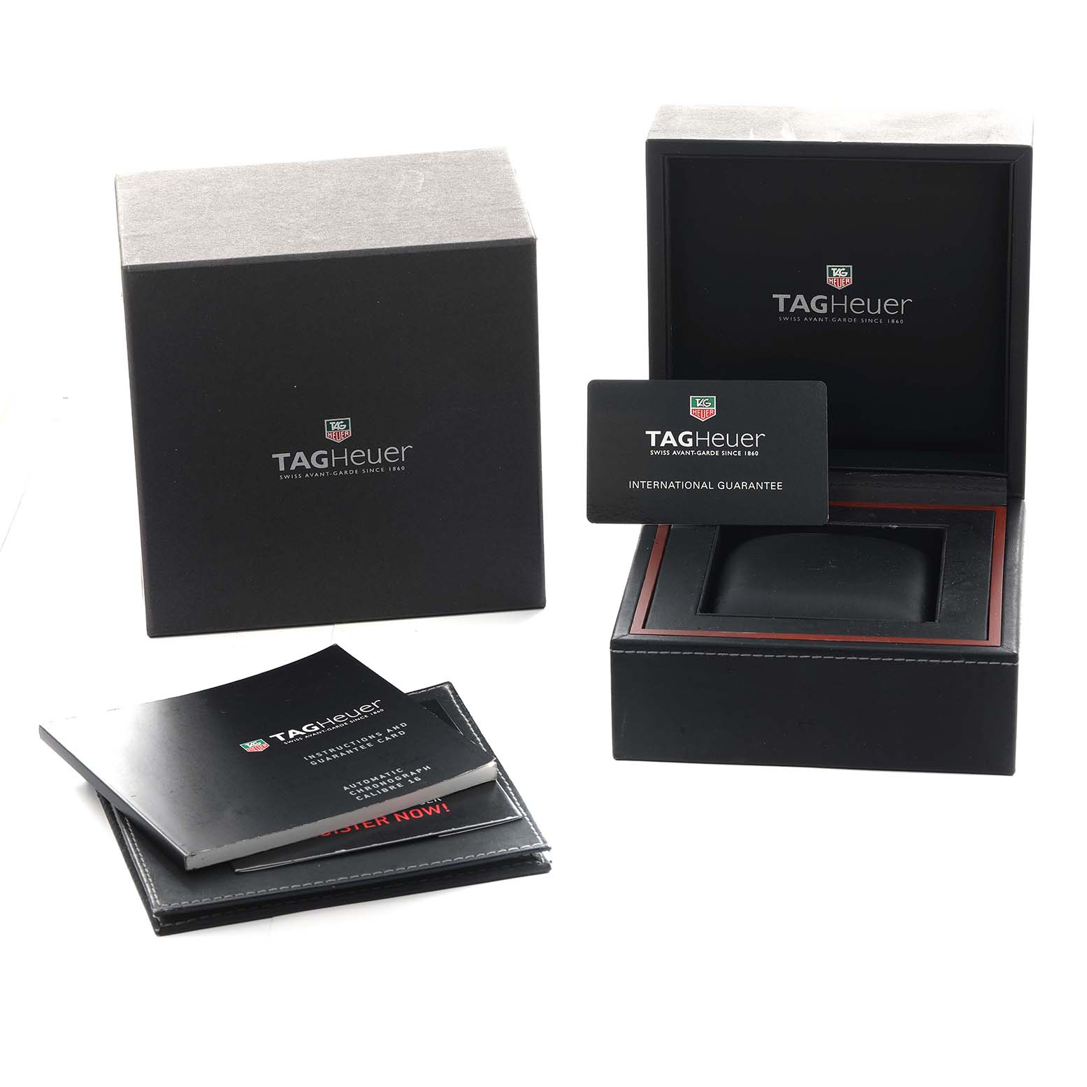 The image shows a TAG Heuer Carrera packaging set, including the box, international guarantee card, and manuals.