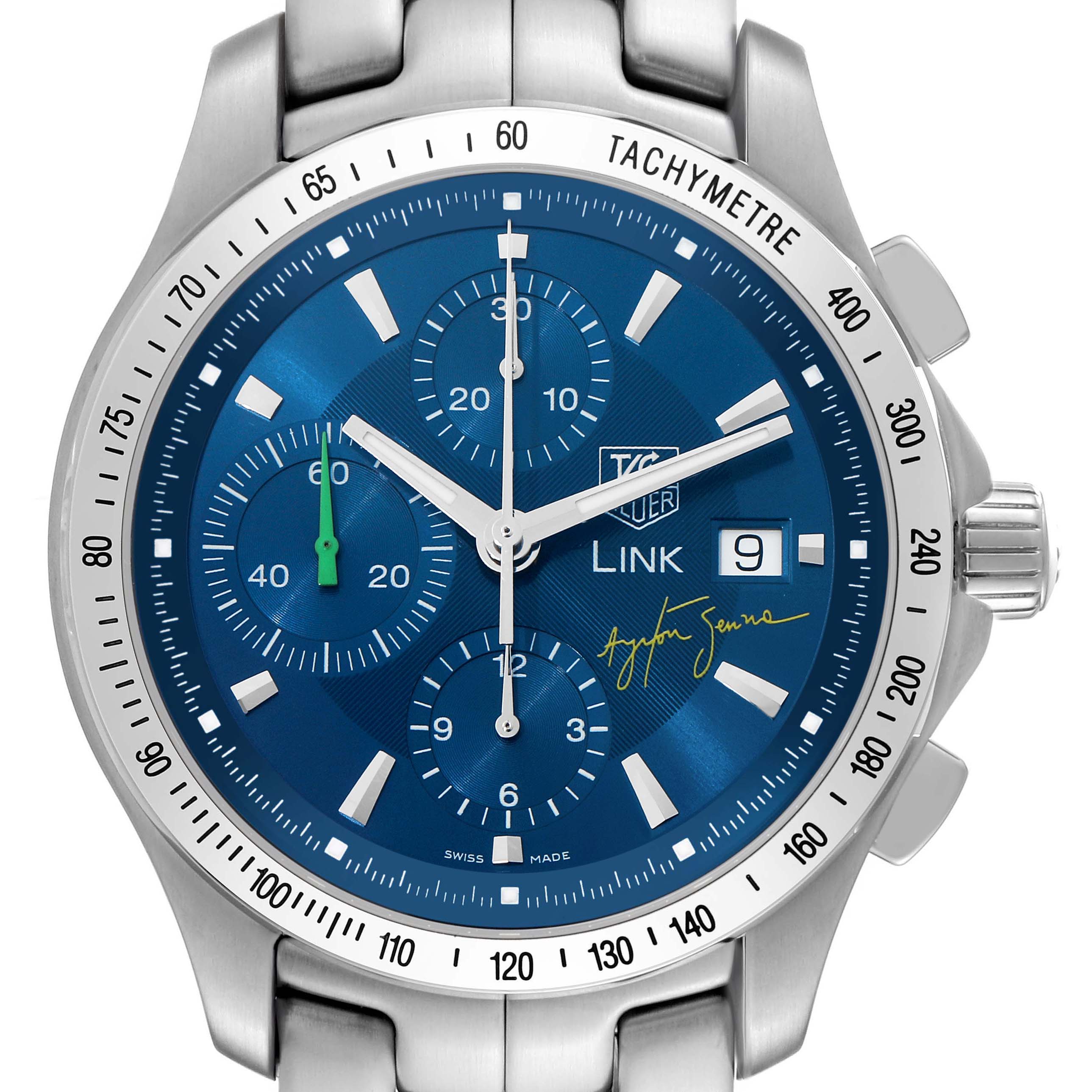 The Tag Heuer Link Limited Edition watch is shown from a front angle, highlighting the blue dial, tachymeter bezel, and crown.