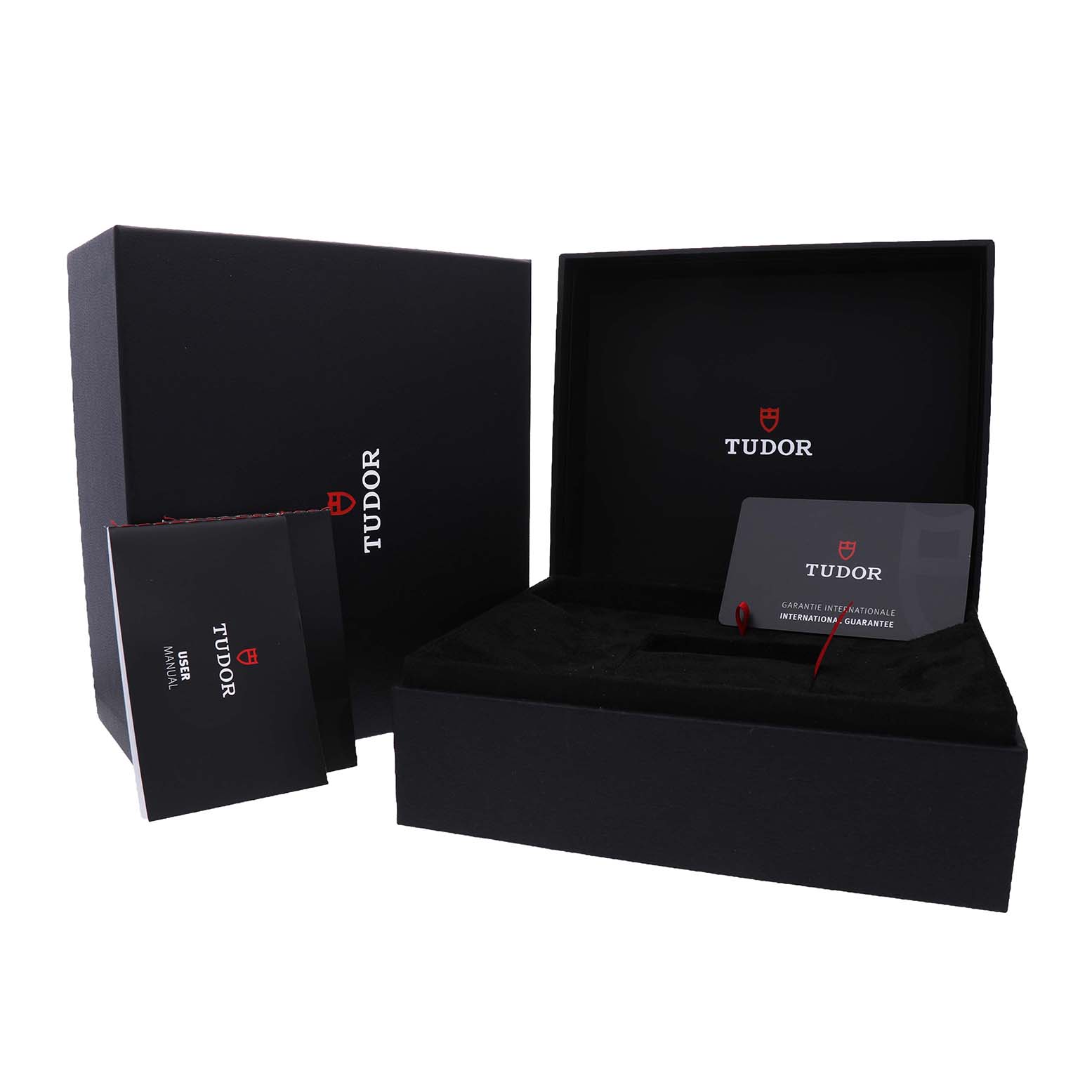 The image shows the Tudor Heritage Black Bay M79000N-0002 Men's Stainless Steel Black Dial packaging, including the box, manual, and warranty card.