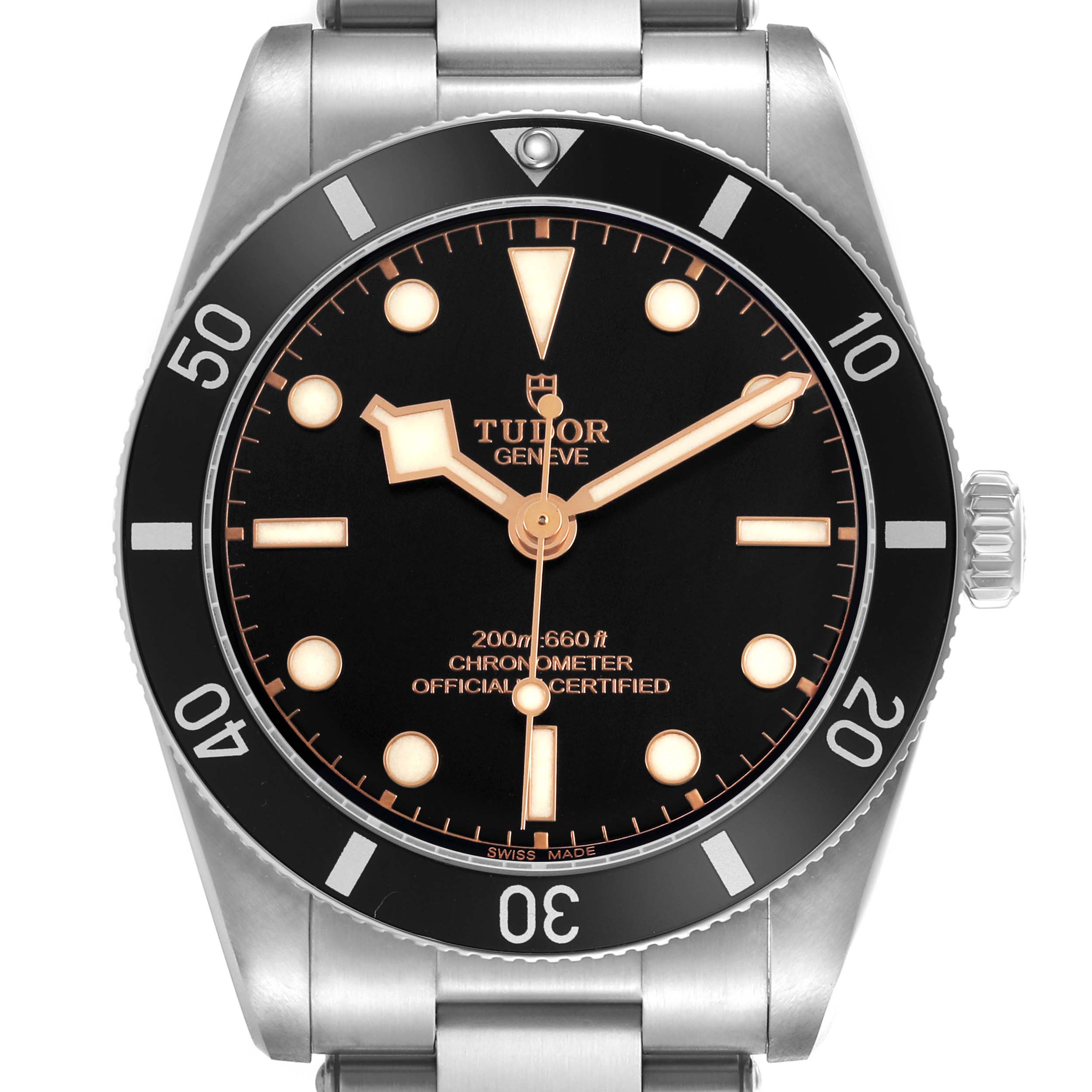The Tudor Heritage Black Bay M79000N-0002 Men's Stainless Steel Black Dial watch is shown from a front angle, highlighting the dial, bezel, and bracelet.