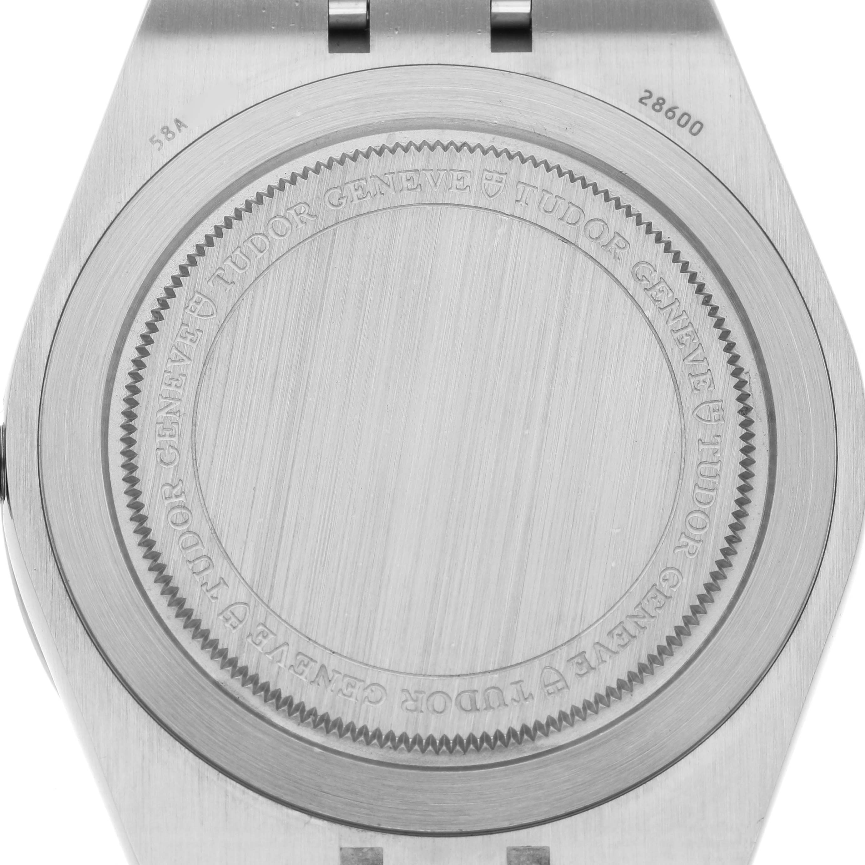 The image shows the case back of a Tudor Royal 28600 Men's Stainless Steel Blue Dial watch, featuring engraved branding details.