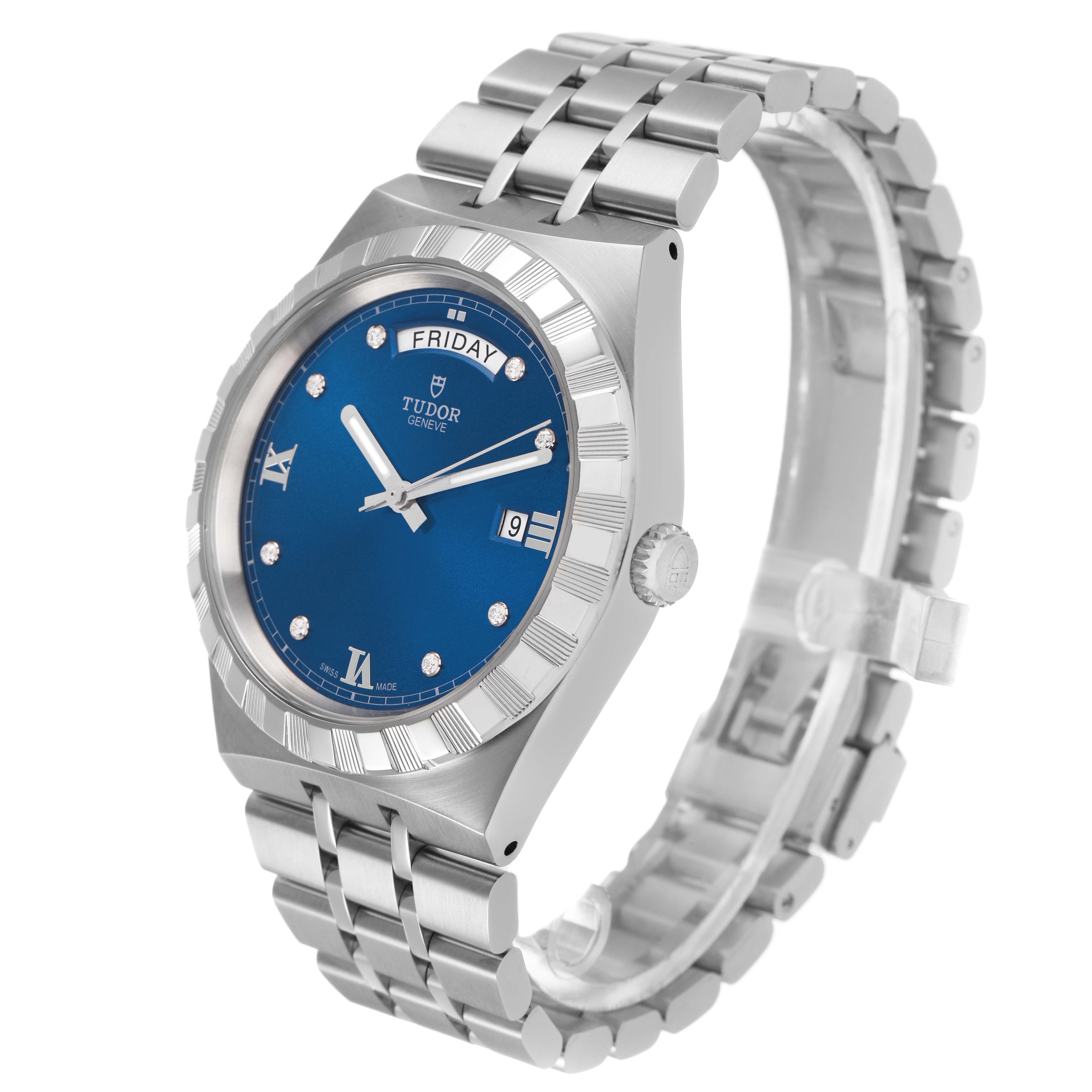The Tudor Royal 28600 Men's Stainless Steel Blue Dial watch is shown at a three-quarter angle, highlighting the blue dial, bezel, and bracelet.