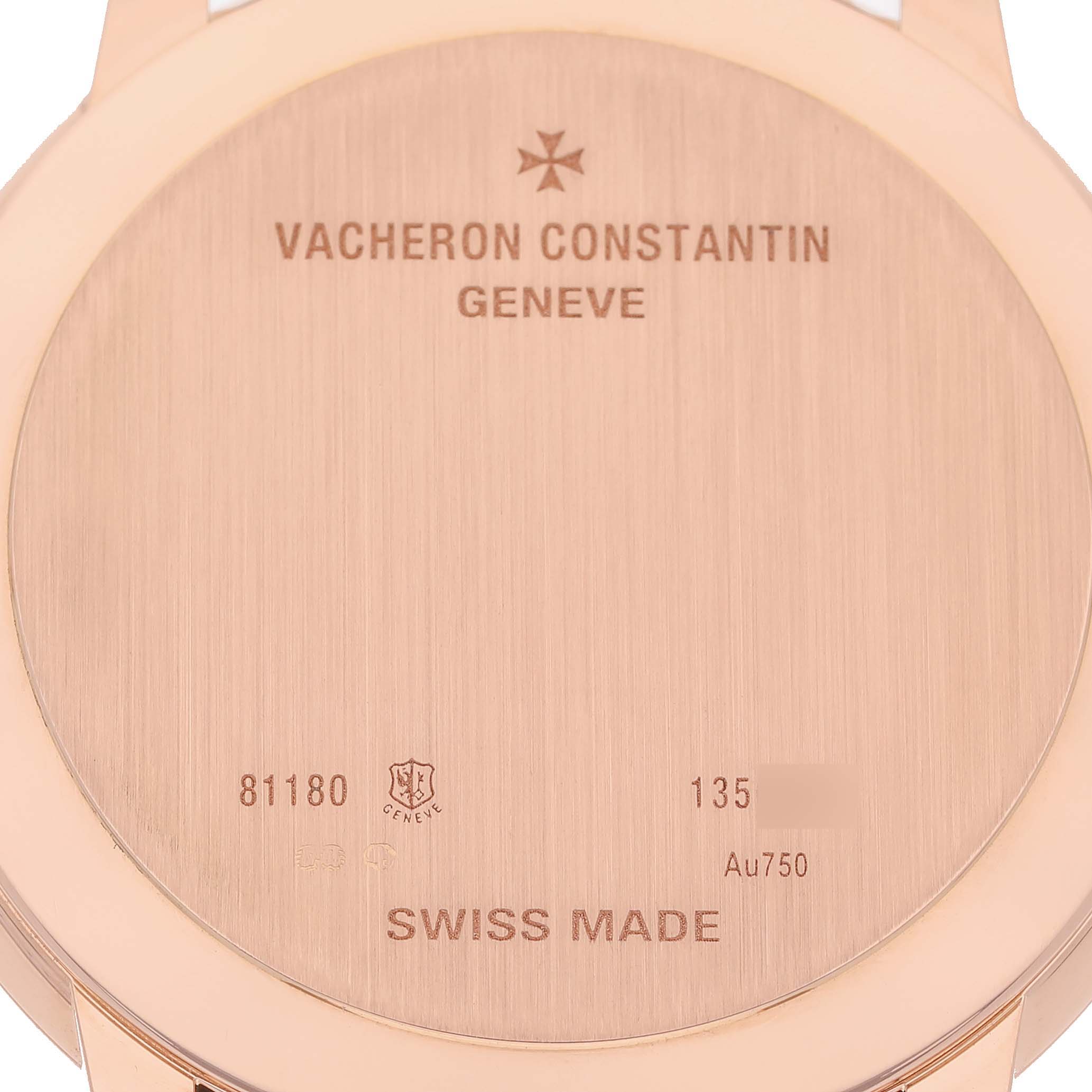 The image shows the back of a Vacheron Constantin Patrimony 81180 Men's Rose Gold Grey Dial watch with engraved details.