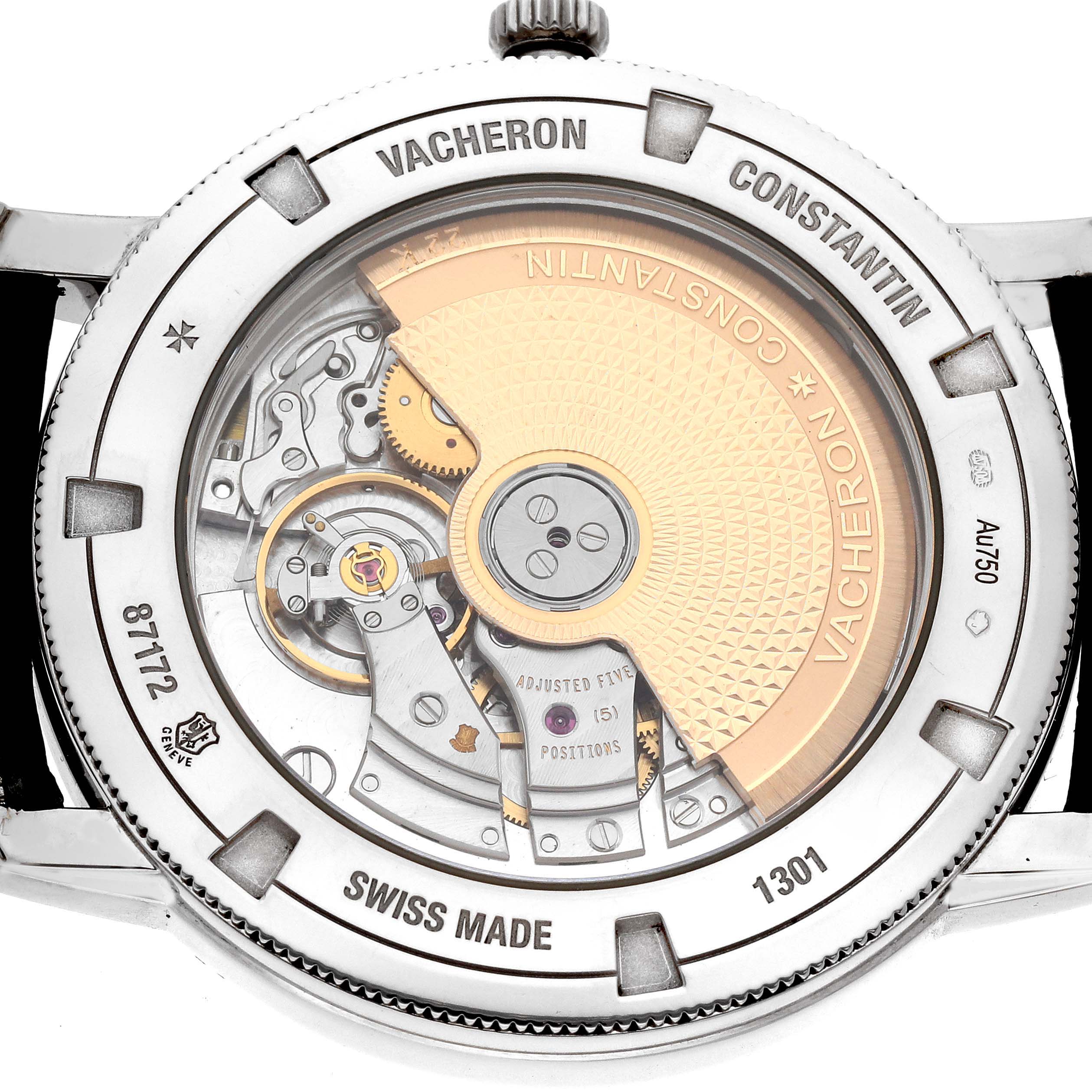 The image shows the back view of the Traditionnelle model by Vacheron Constantin, highlighting the movement and internal mechanisms.