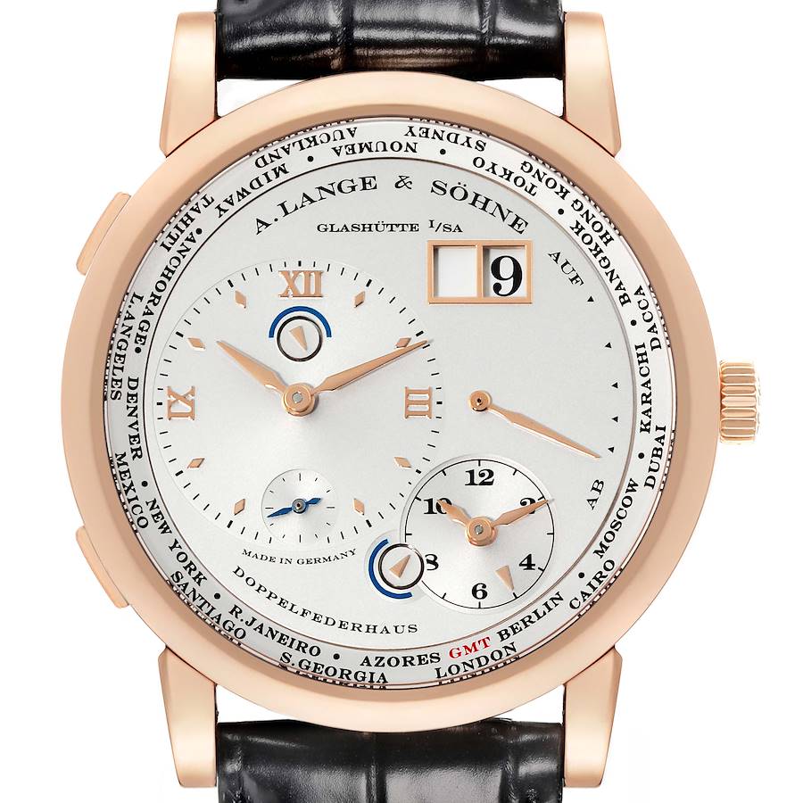 The image shows a frontal view of the Lange 1 watch by A. Lange & Söhne, highlighting its dial, hands, date display, and world time cities ring.