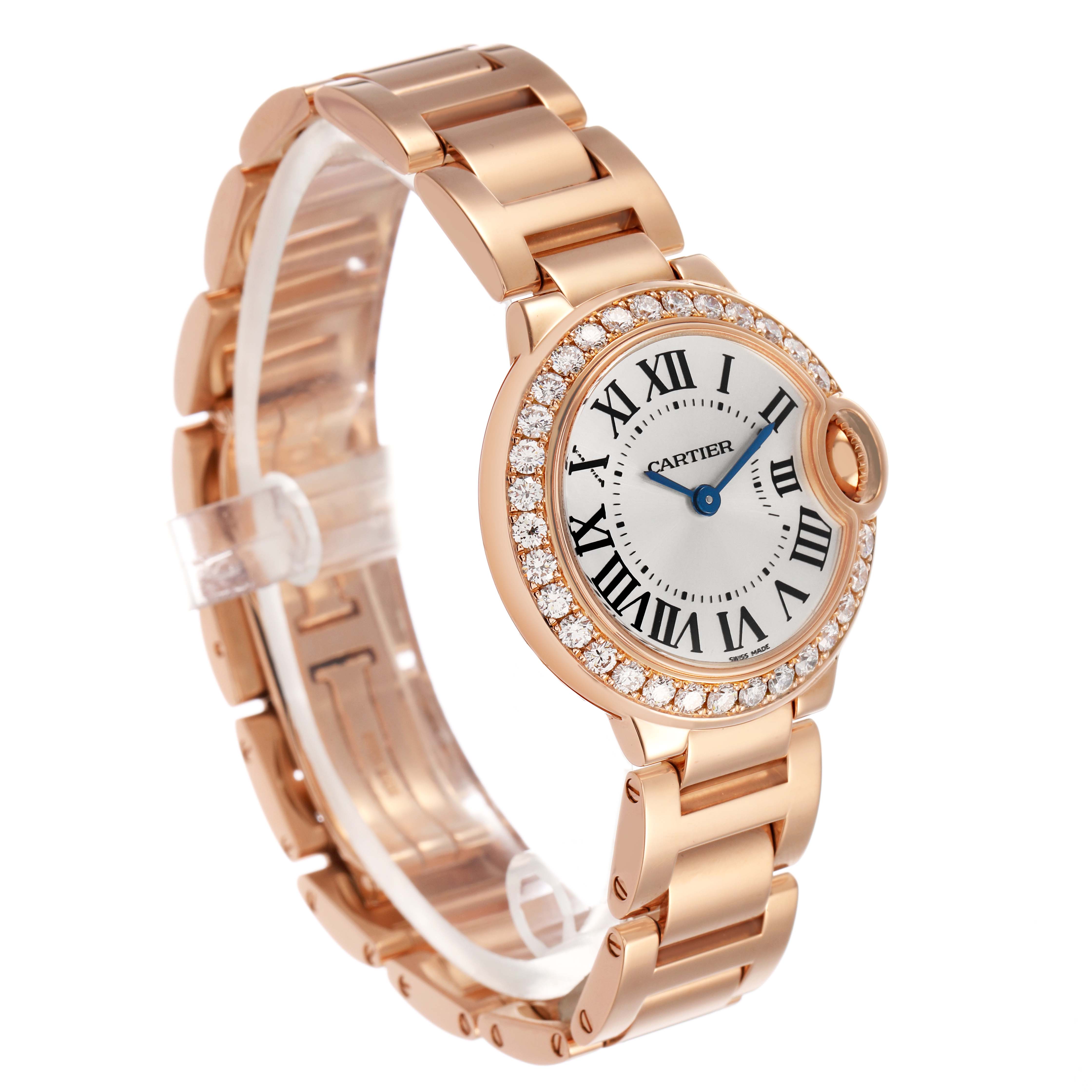 The Cartier Ballon Bleu WE9002Z3 Women's Rose Gold Silver Dial watch is shown at a three-quarter angle, highlighting the face, bezel, and bracelet.