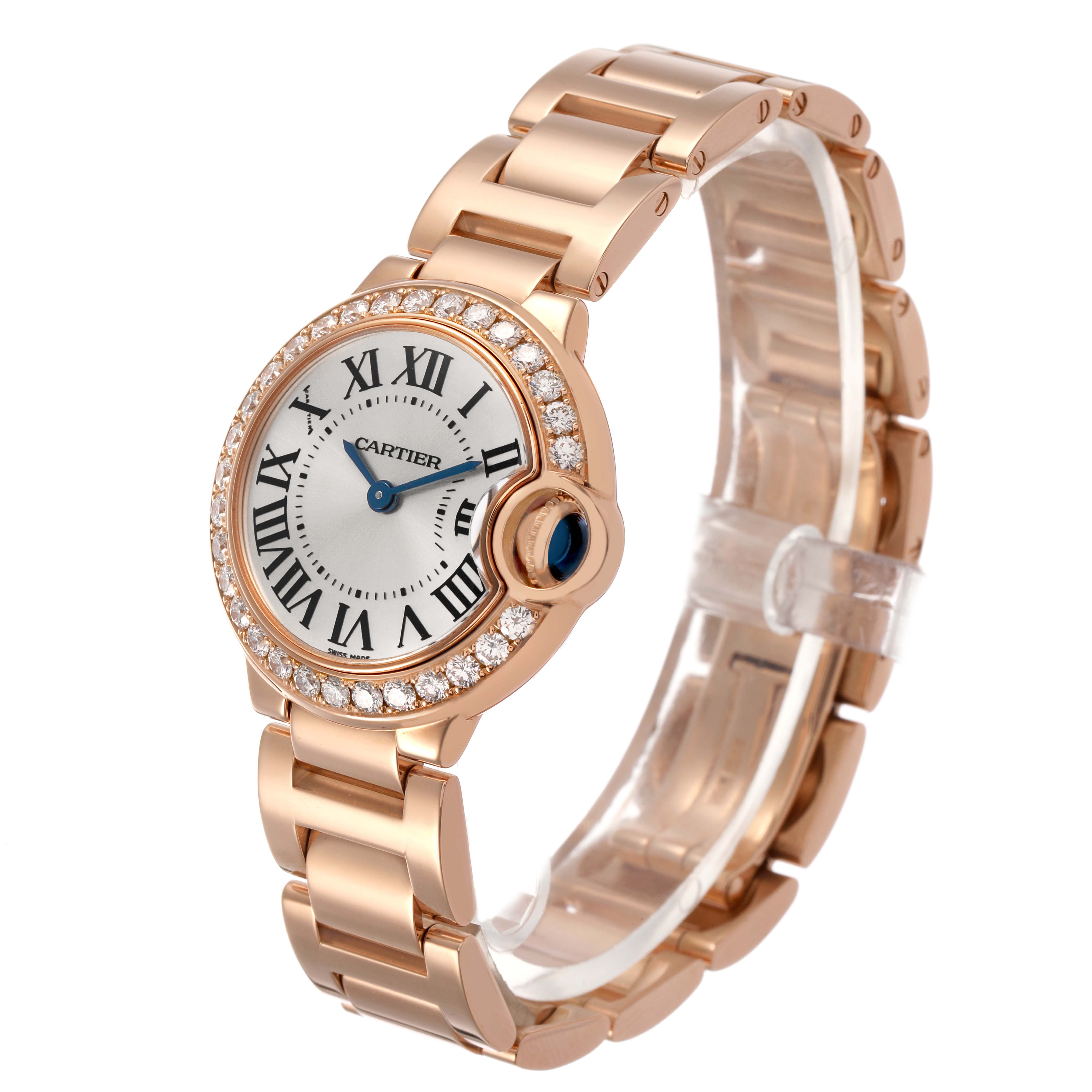 The Cartier Ballon Bleu WE9002Z3 Women's Rose Gold Silver Dial watch is shown at a three-quarter angle, highlighting the case, dial, bracelet, and diamond bezel.