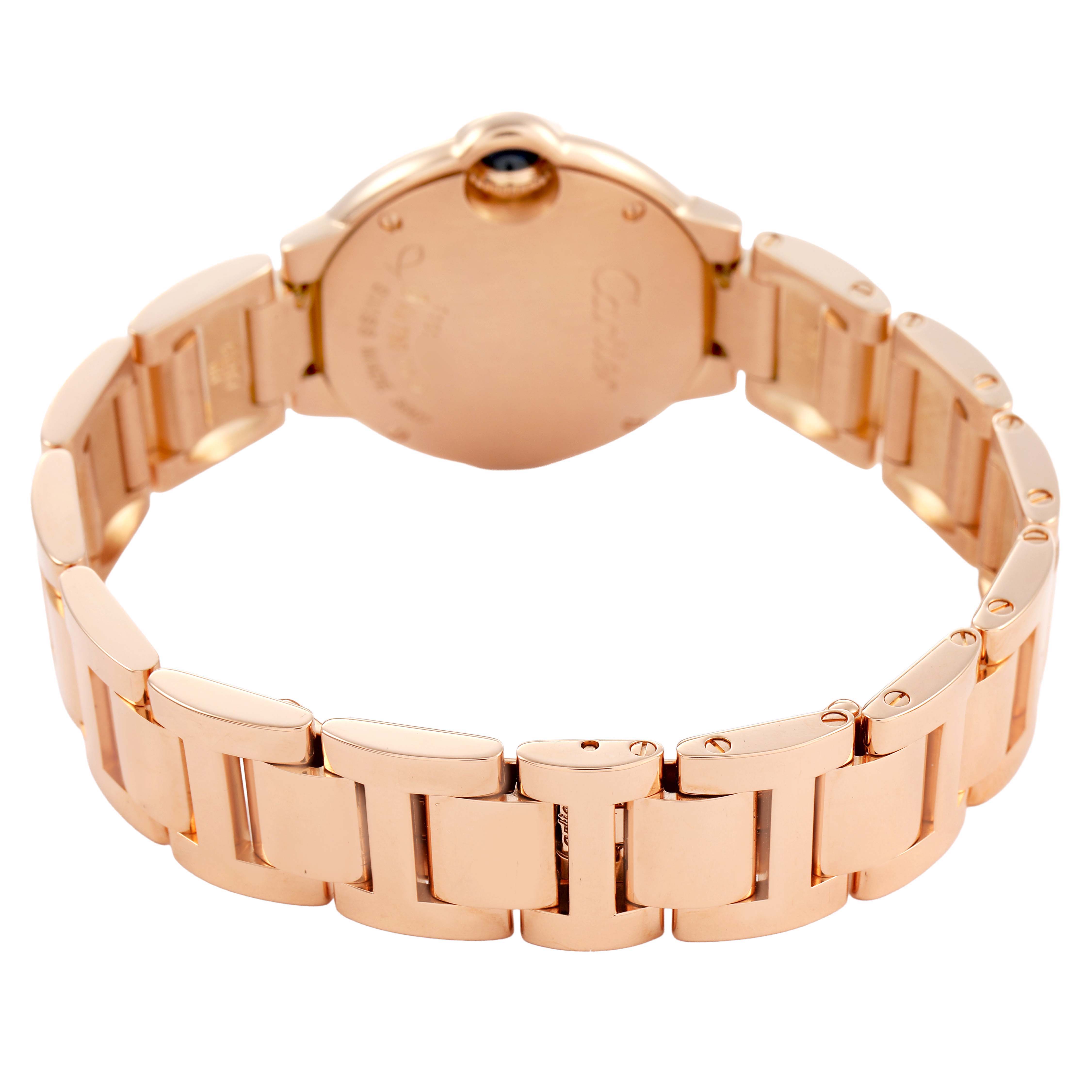 The image shows the back and bracelet of a Cartier Ballon Bleu WE9002Z3 Women's Rose Gold Silver Dial watch, highlighting its rose gold links and case back.