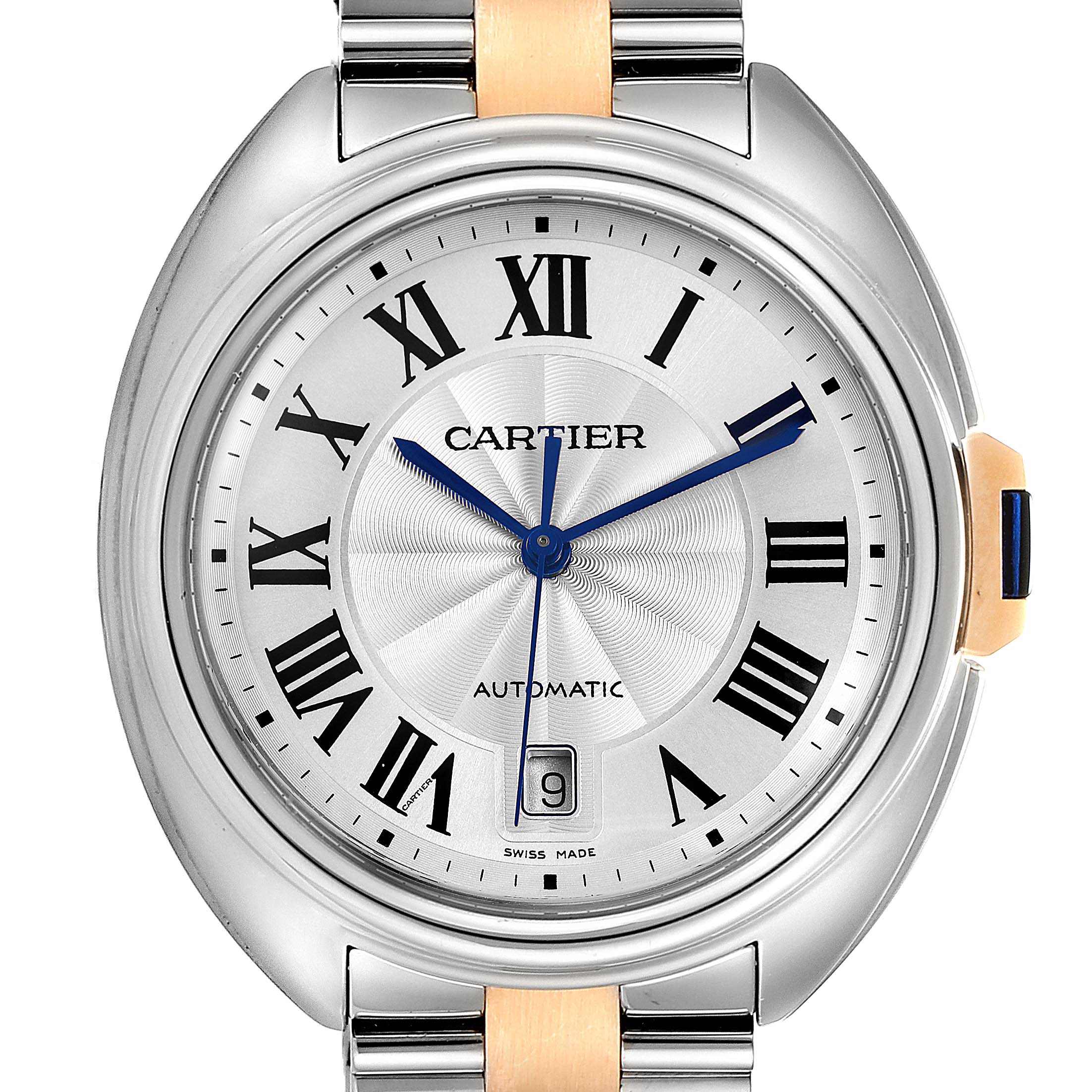 This image shows a close-up of a Cartier Cle W2CL0002 Men's Steel and Gold (two tone) Silver Dial W2CL0002 Men's Steel and Gold (two tone) Silver Dial model watch face with its dial, Roman numerals, and bracelet.