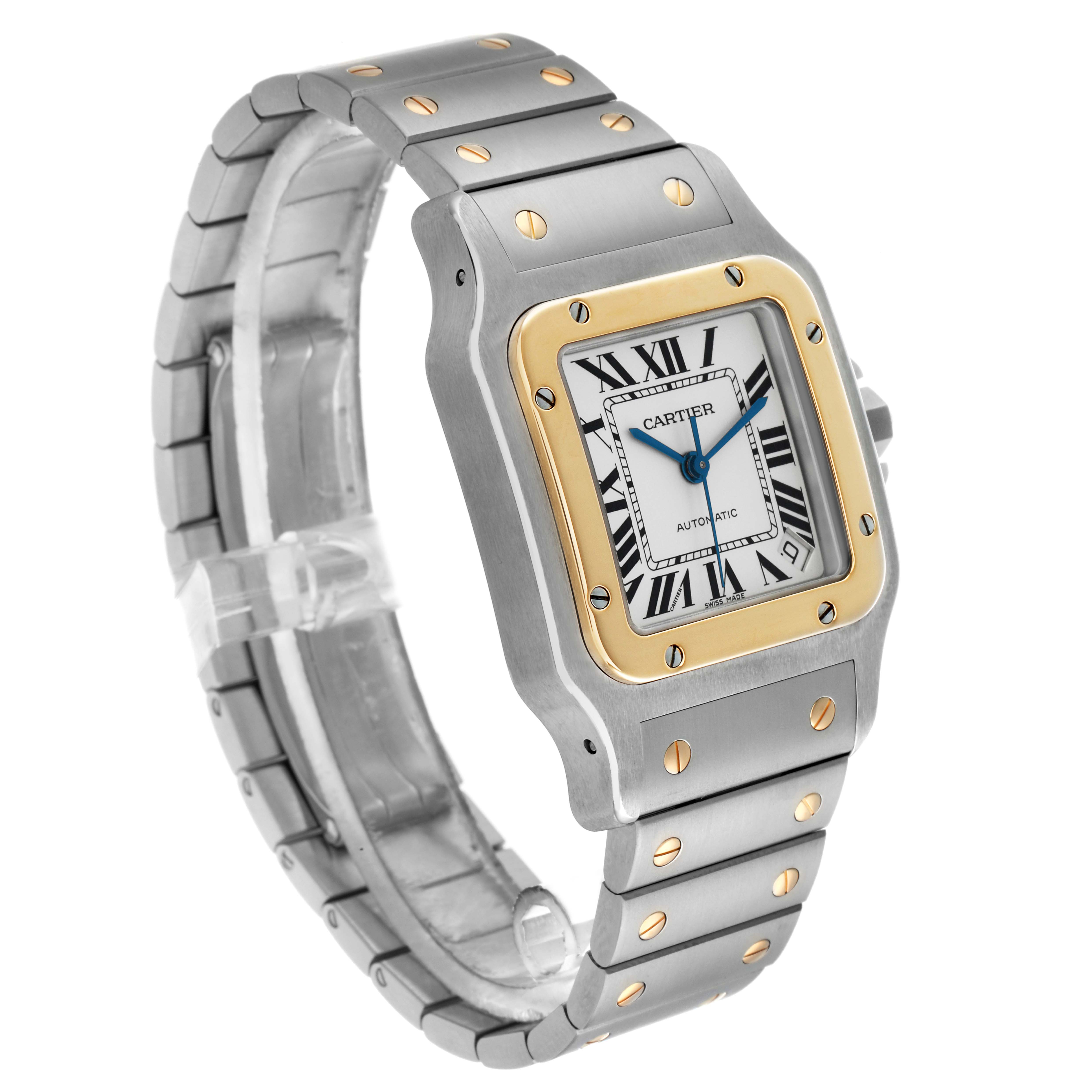 The Cartier Santos W20099C4 Men
s Steel and Gold (two tone) Silver Dial watch is shown at a three-quarter angle, highlighting its square face, gold bezel, Roman numerals, and metal bracelet.