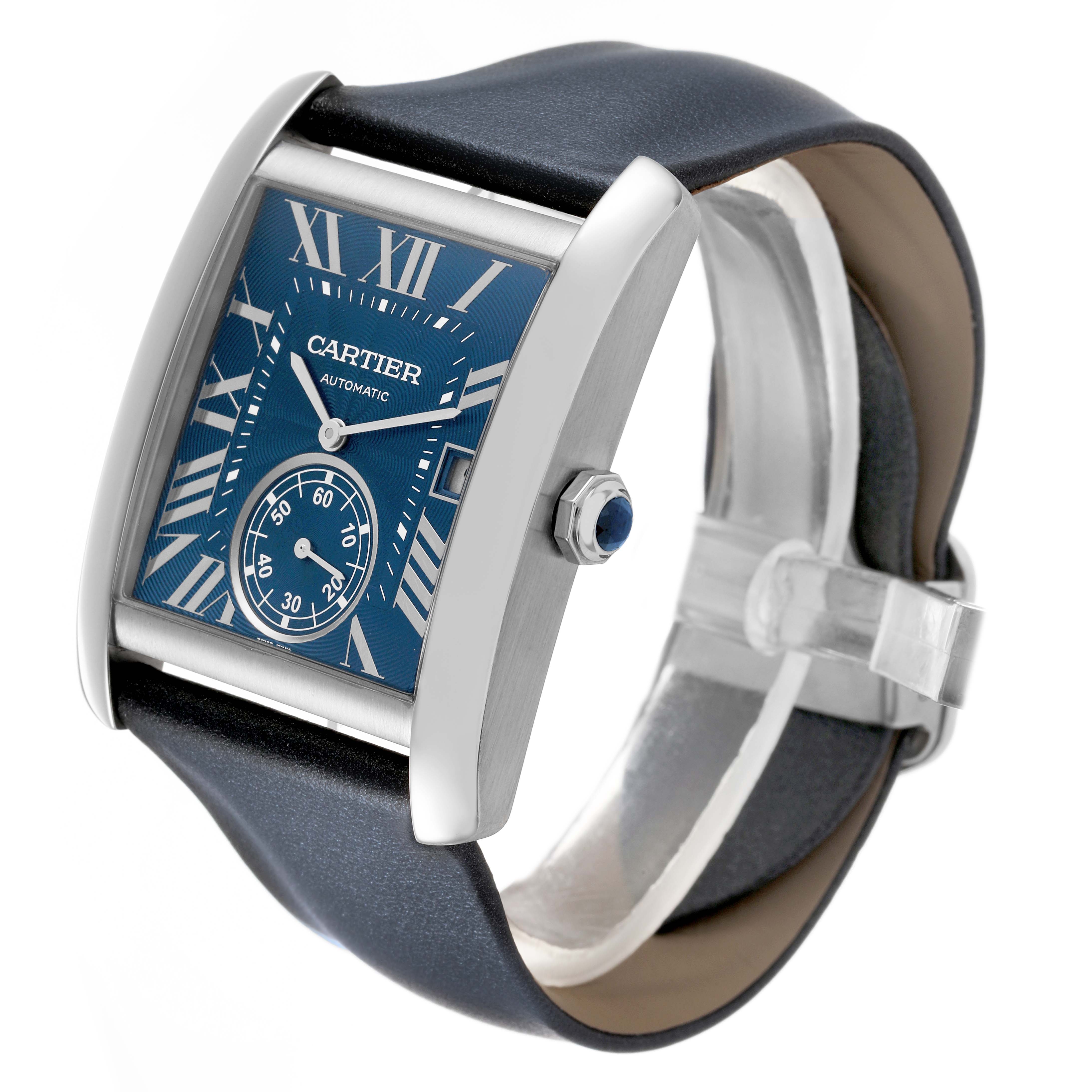 The Cartier Tank MC WSTA0010 Men's Stainless Steel Blue Dial watch is shown at an angle highlighting its blue dial, Roman numerals, crown, and leather strap.