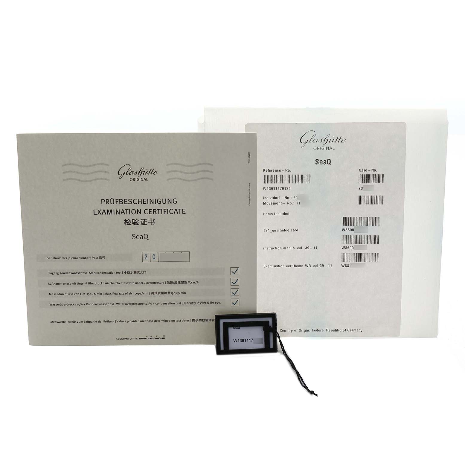 The image shows Glashütte Original SeaQ model documentation and a tag, no watch visible.