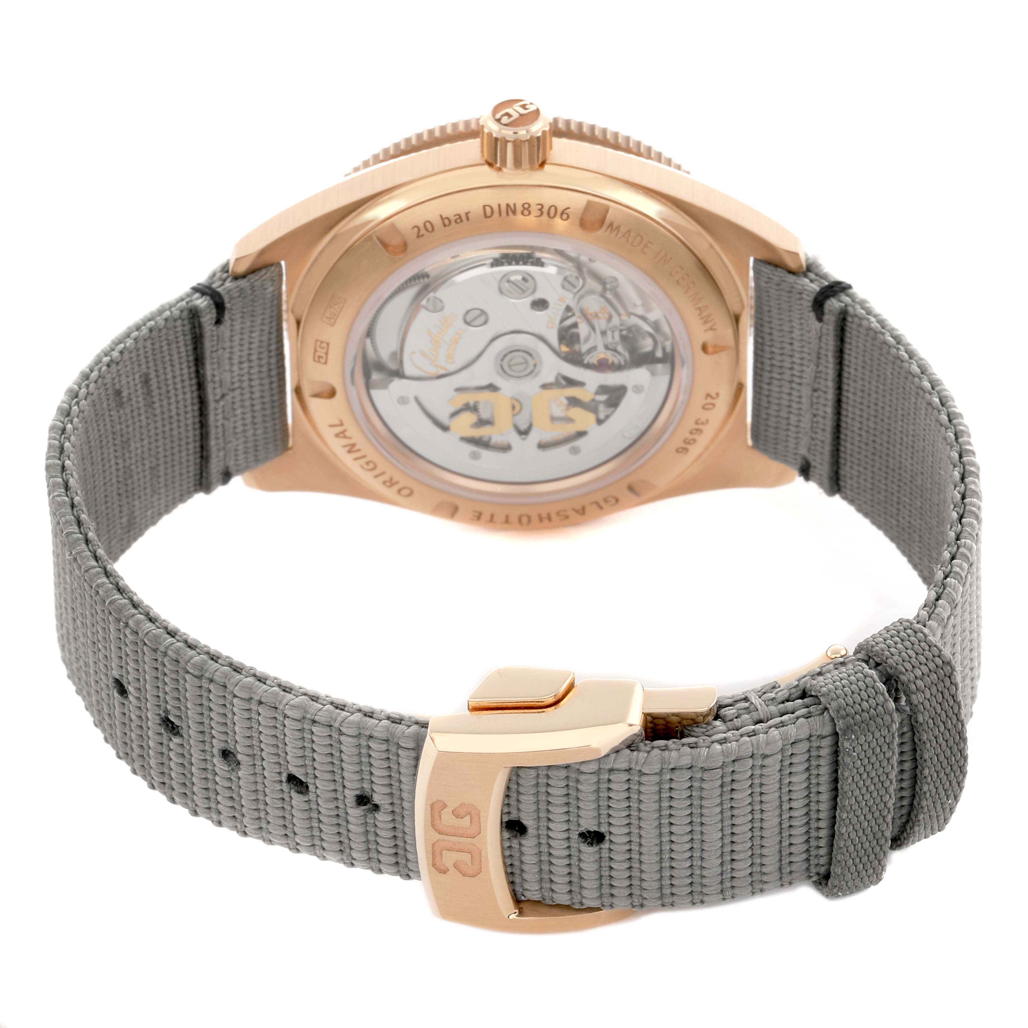 The image shows the back view of a Glashutte Original 1-39-11-17-91-34 Men
s Rose Gold Black Dial watch, highlighting its transparent case back and strap.