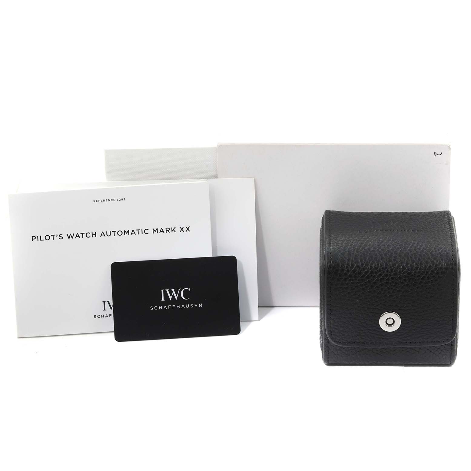 The image shows the packaging, manual, warranty card, and travel case for the IWC Pilot IW328208 Men's Stainless Steel Silver Dial IW328208 Men's Stainless Steel Silver Dial's Watch Automatic Mark XX.