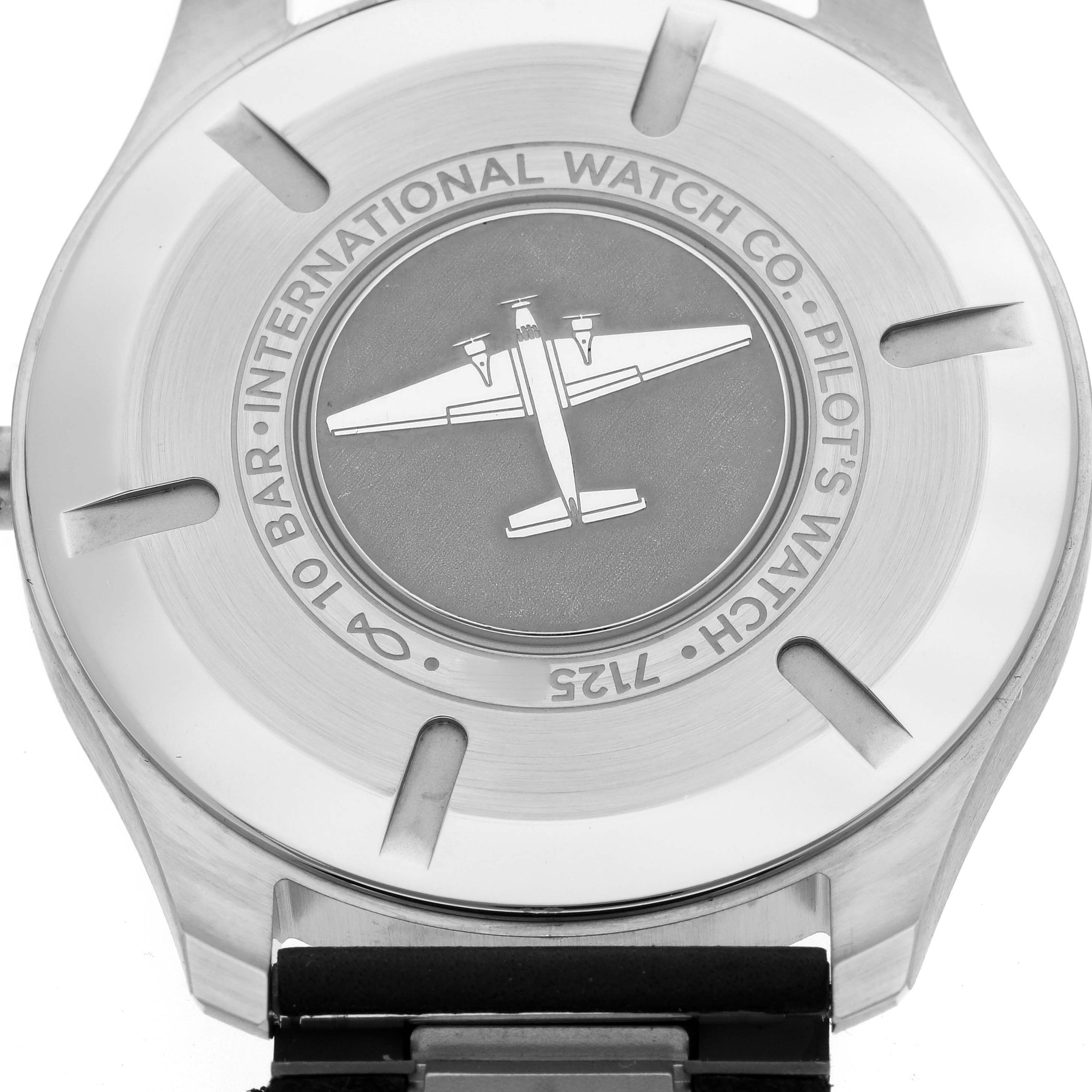 The image shows the back case of an IWC Pilot IW328208 Men's Stainless Steel Silver Dial IW328208 Men's Stainless Steel Silver Dial model watch, highlighting its engraved detailing and brand name.
