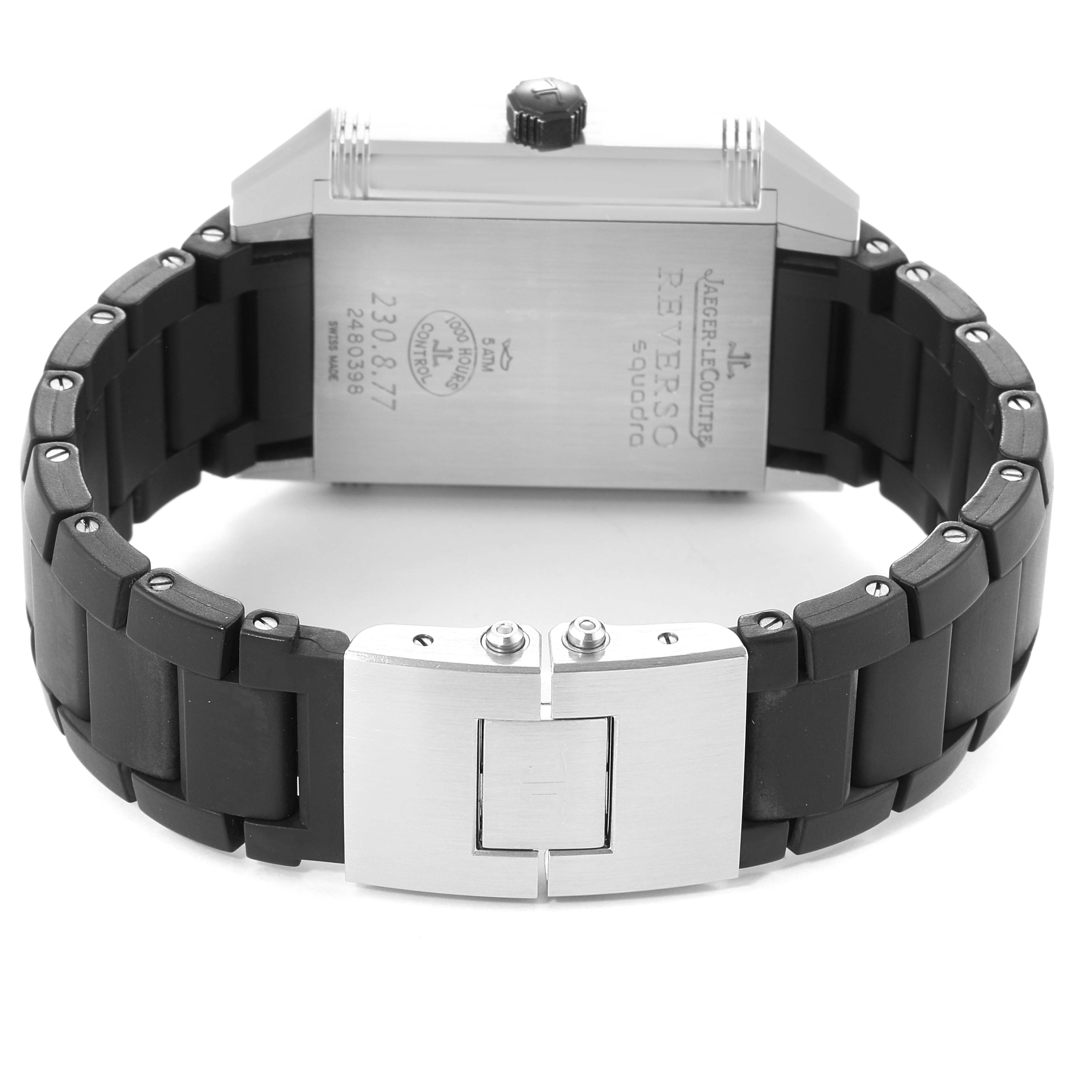 This image shows the back of the Reverso model watch by Jaeger LeCoultre, featuring its clasp and black metal bracelet.