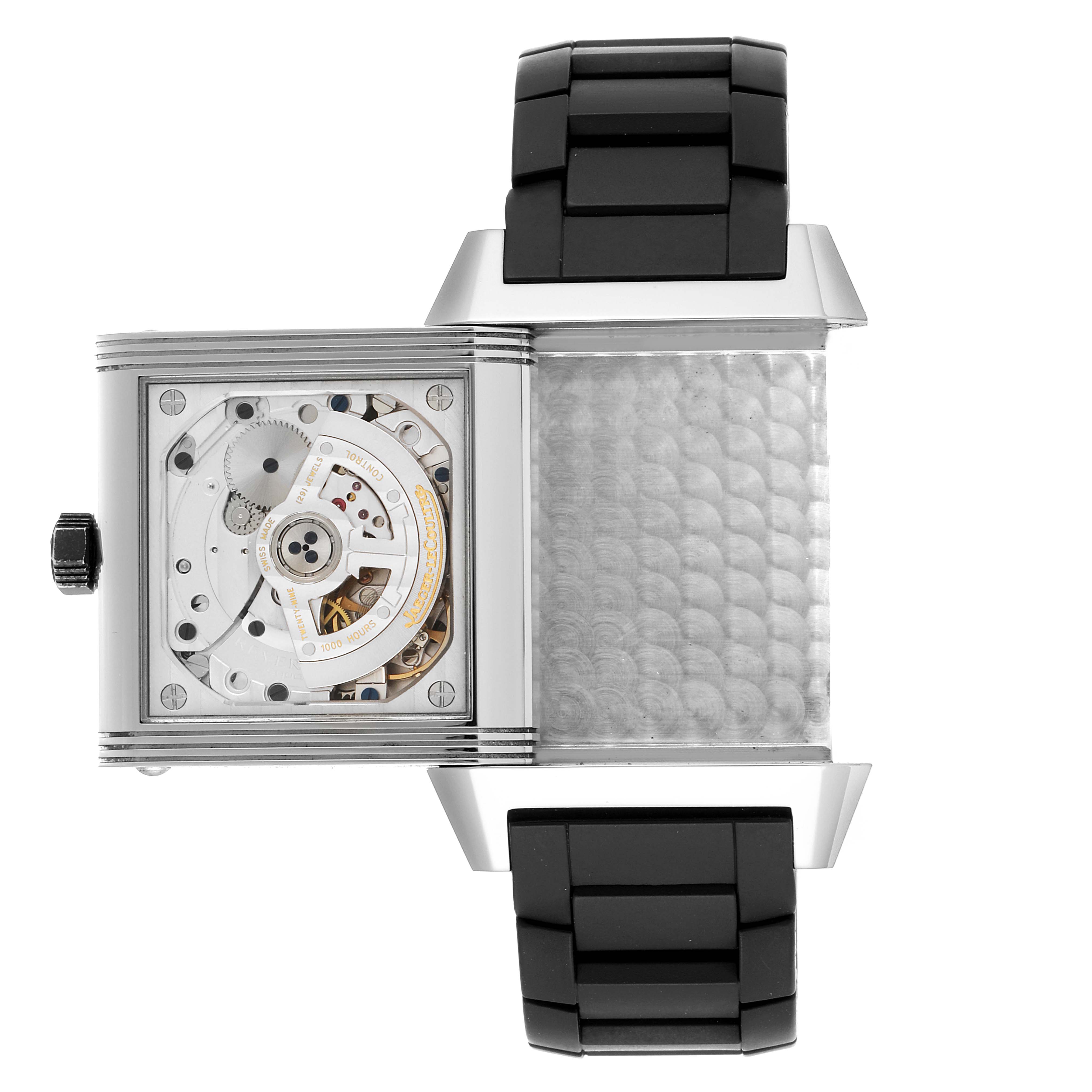The Jaeger LeCoultre Reverso Q700867P Men's Stainless Steel Black Dial Q700867P Men's Stainless Steel Black Dial watch is shown in an open position, revealing its internal mechanism and black strap elements.