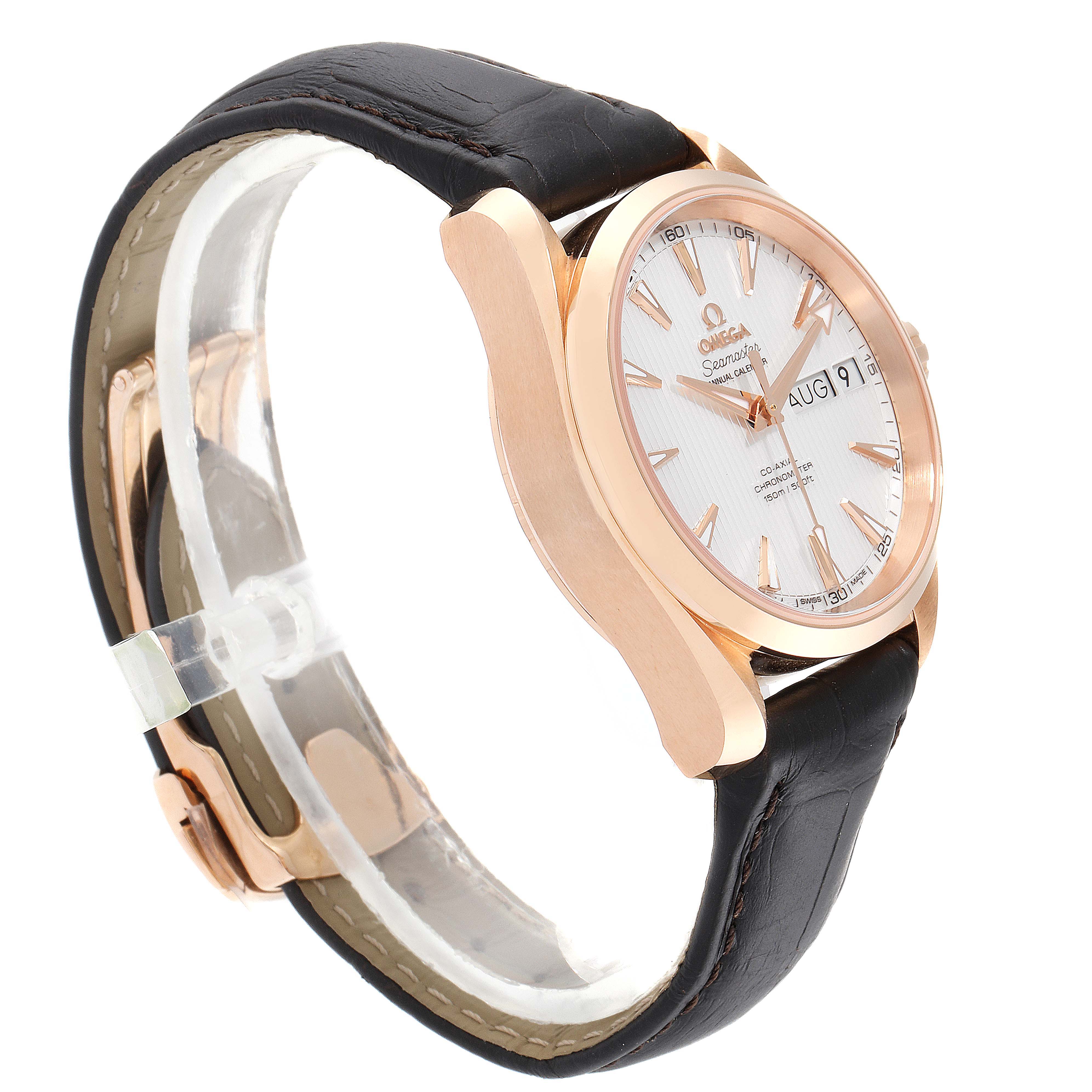 The Omega Aqua Terra 231.53.39.22.02.001 Men
s Rose Gold Silver Dial 231.53.39.22.02.001 Men
s Rose Gold Silver Dial watch is shown at an angle highlighting its rose gold case, leather strap, and part of the dial with date display.