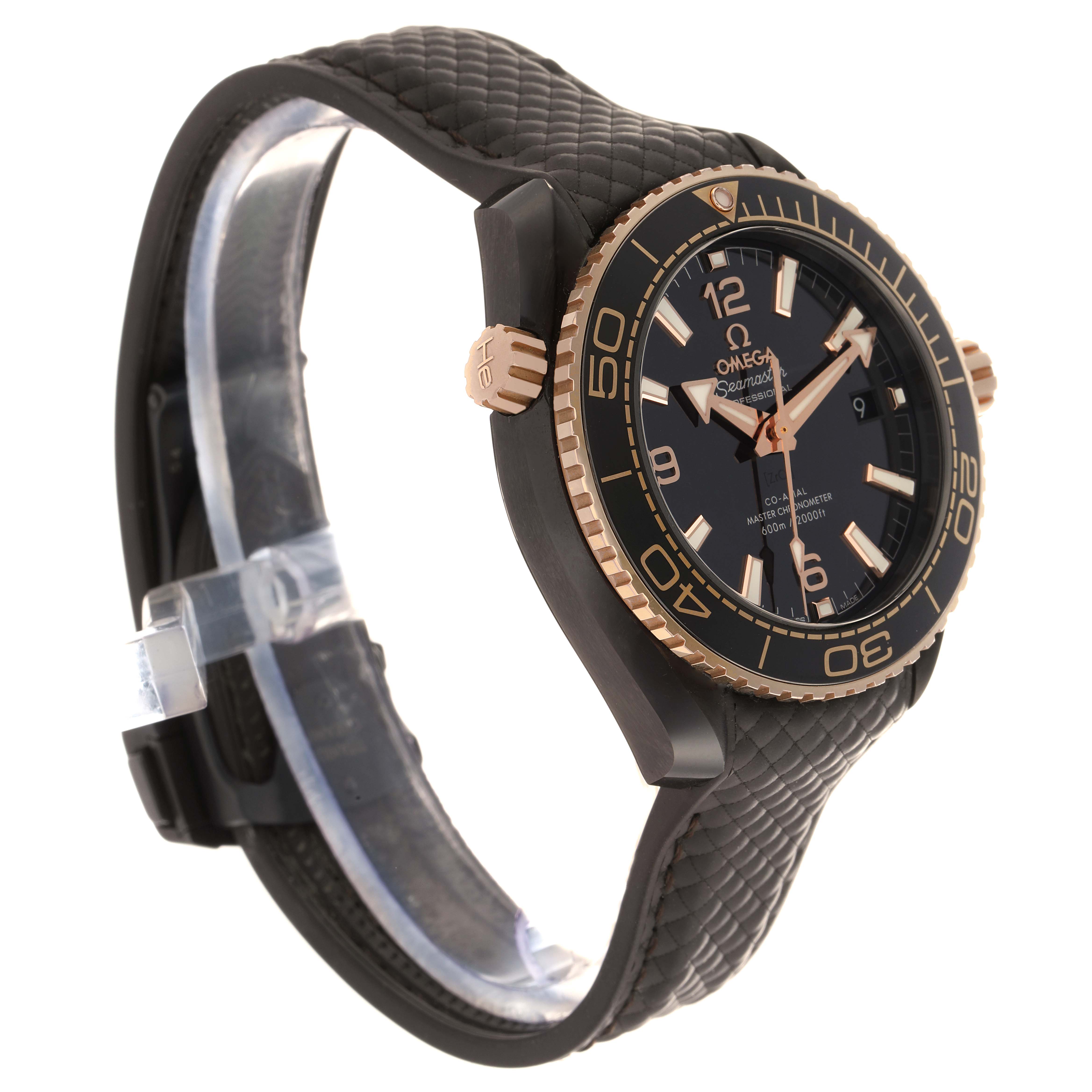 The Omega Planet Ocean 215.62.40.20.13.001 Men
s Rose Gold Black Dial watch is shown at an angle highlighting the dial, bezel, and textured rubber strap.
