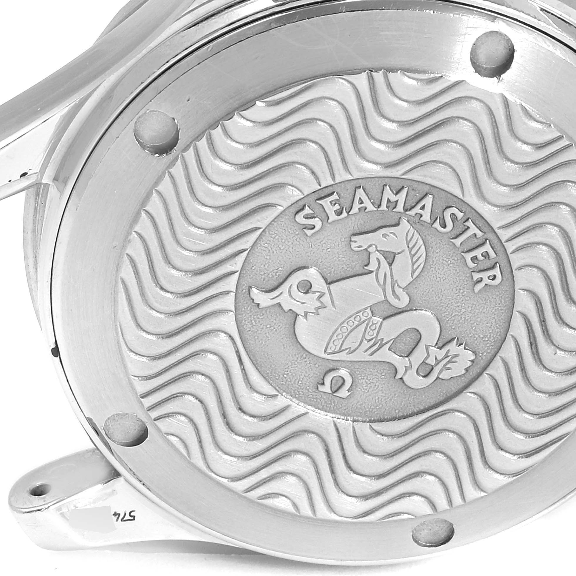 The image shows the case back of an Omega Seamaster 2561.80.00 Men's Stainless Steel Blue Dial 2561.80.00 Men's Stainless Steel Blue Dial watch, capturing its decorative engraving.