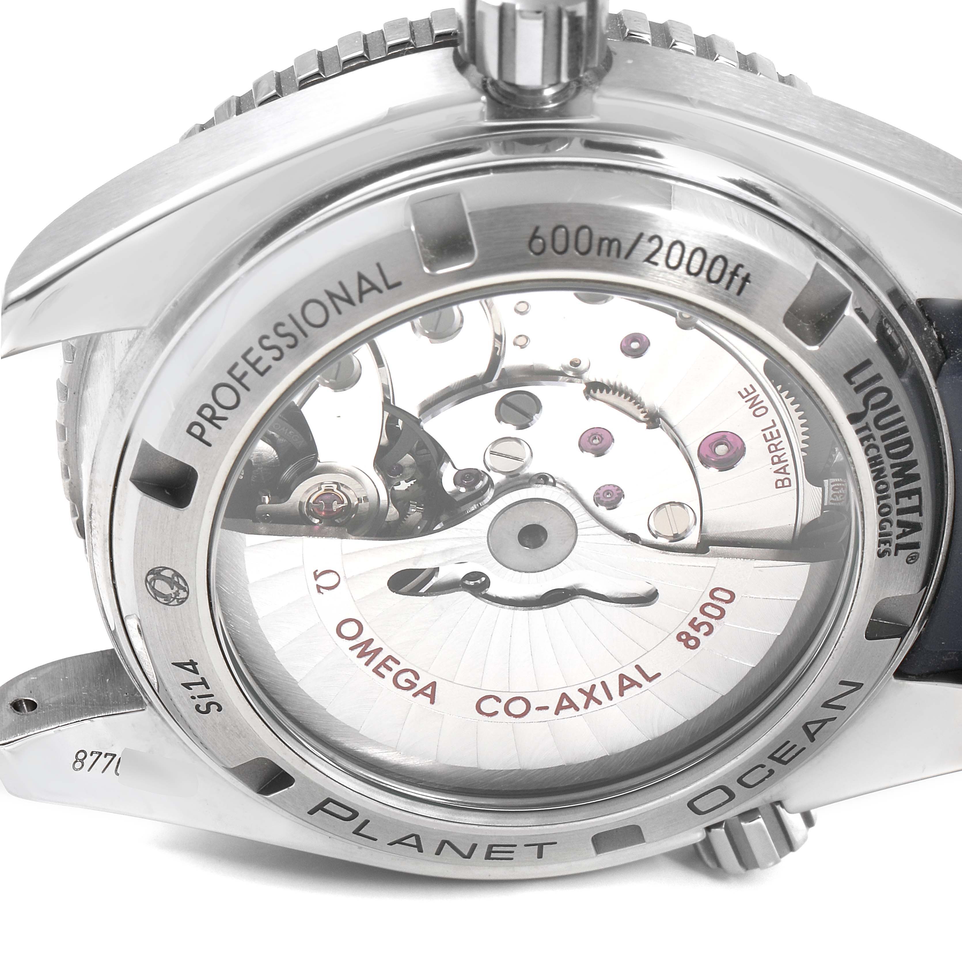 The image shows the back case and movement of an Omega Seamaster 232.92.42.21.03.001 Men's Stainless Steel Blue Dial 232.92.42.21.03.001 Men's Stainless Steel Blue Dial Planet Ocean watch, highlighting the 8500 co-axial mechanism.