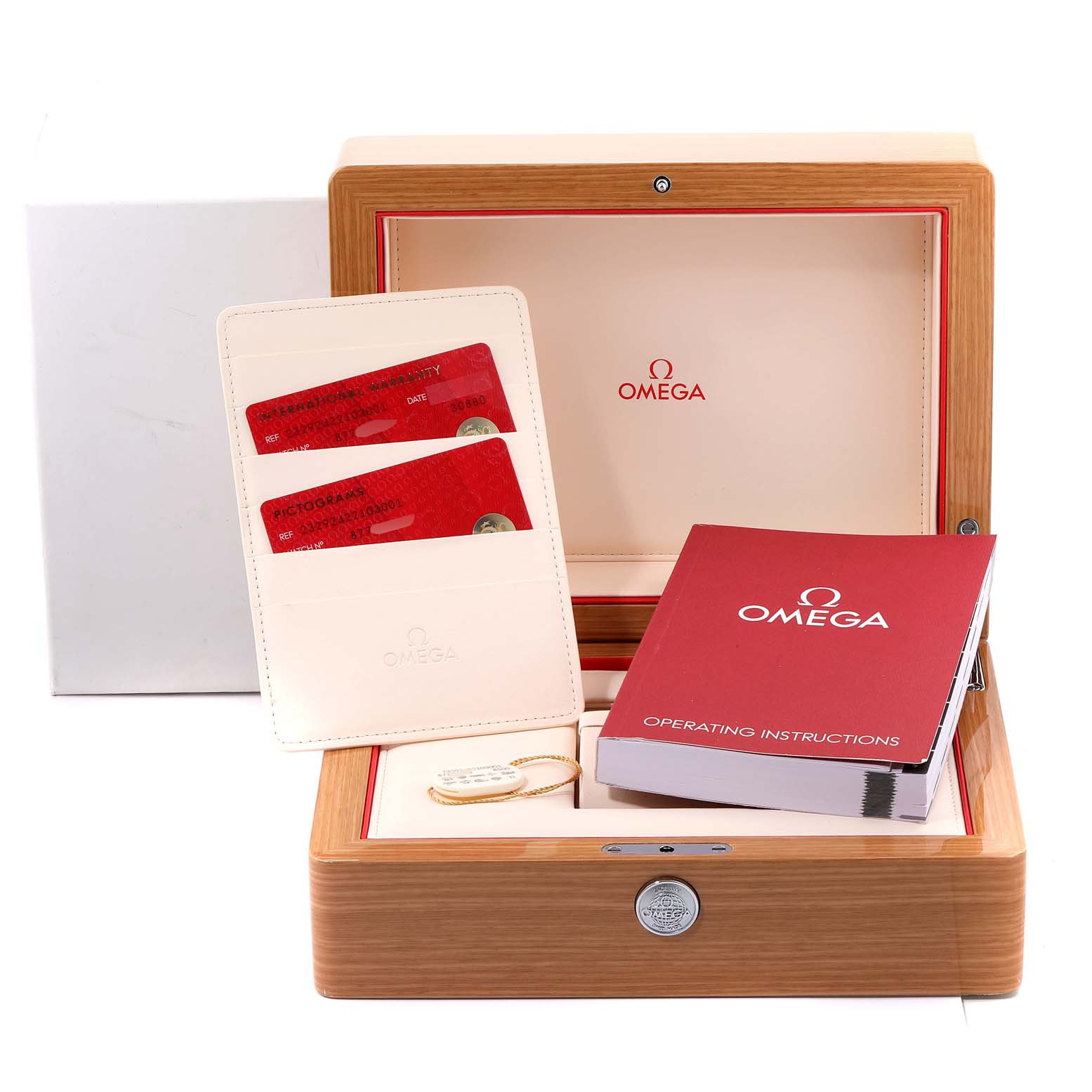 The image shows an opened wooden Omega Seamaster 232.92.42.21.03.001 Men's Stainless Steel Blue Dial 232.92.42.21.03.001 Men's Stainless Steel Blue Dial watch box, cardholder with warranty cards, and a user manual.