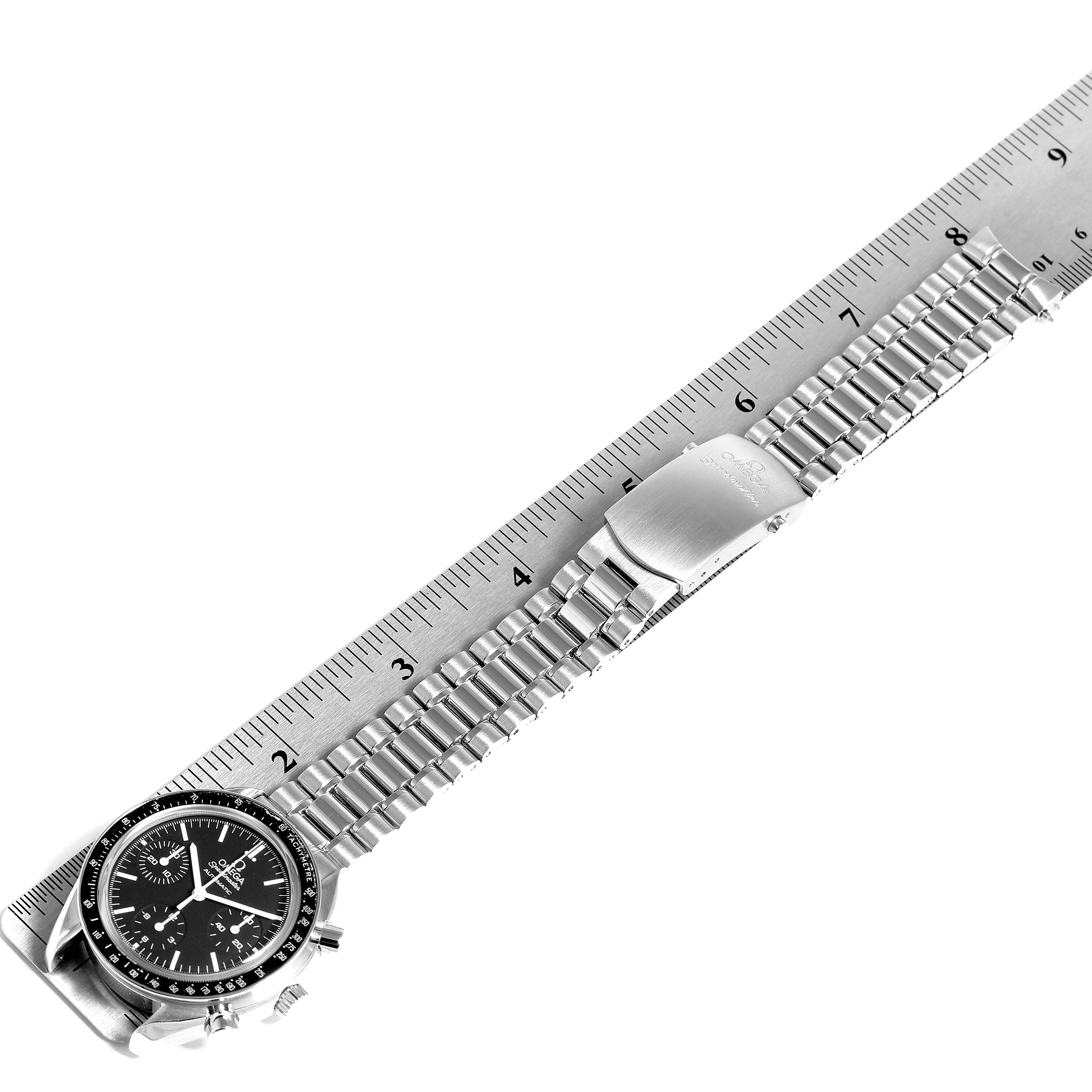 The image shows an Omega Speedmaster 3539.50.00 Men's Stainless Steel Black Dial 3539.50.00 Men's Stainless Steel Black Dial watch laid flat next to a ruler, highlighting the bracelet and clasp.