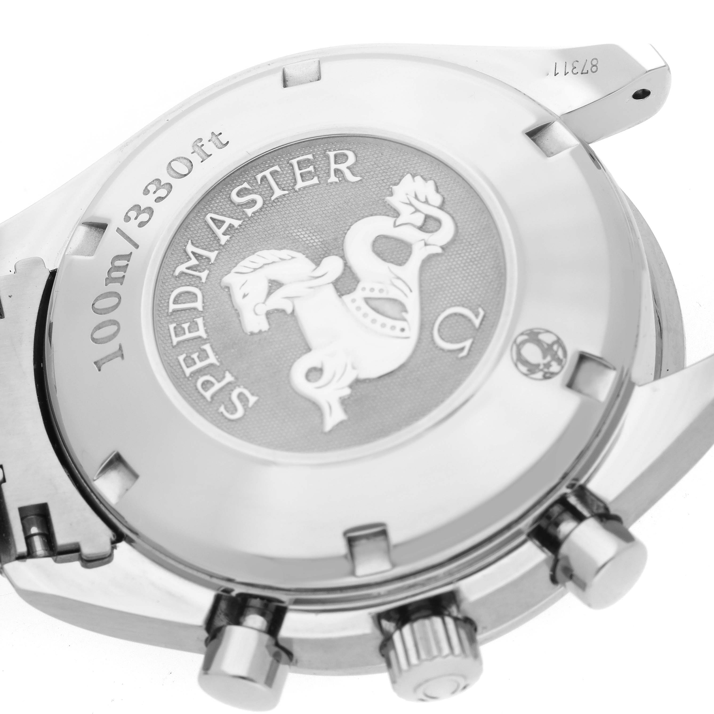 The image shows the back case of the Omega Speedmaster 323.30.40.40.06.001 Men's Stainless Steel Grey Dial 323.30.40.40.06.001 Men's Stainless Steel Grey Dial watch, highlighting the text, logo, and pushers from an oblique angle.